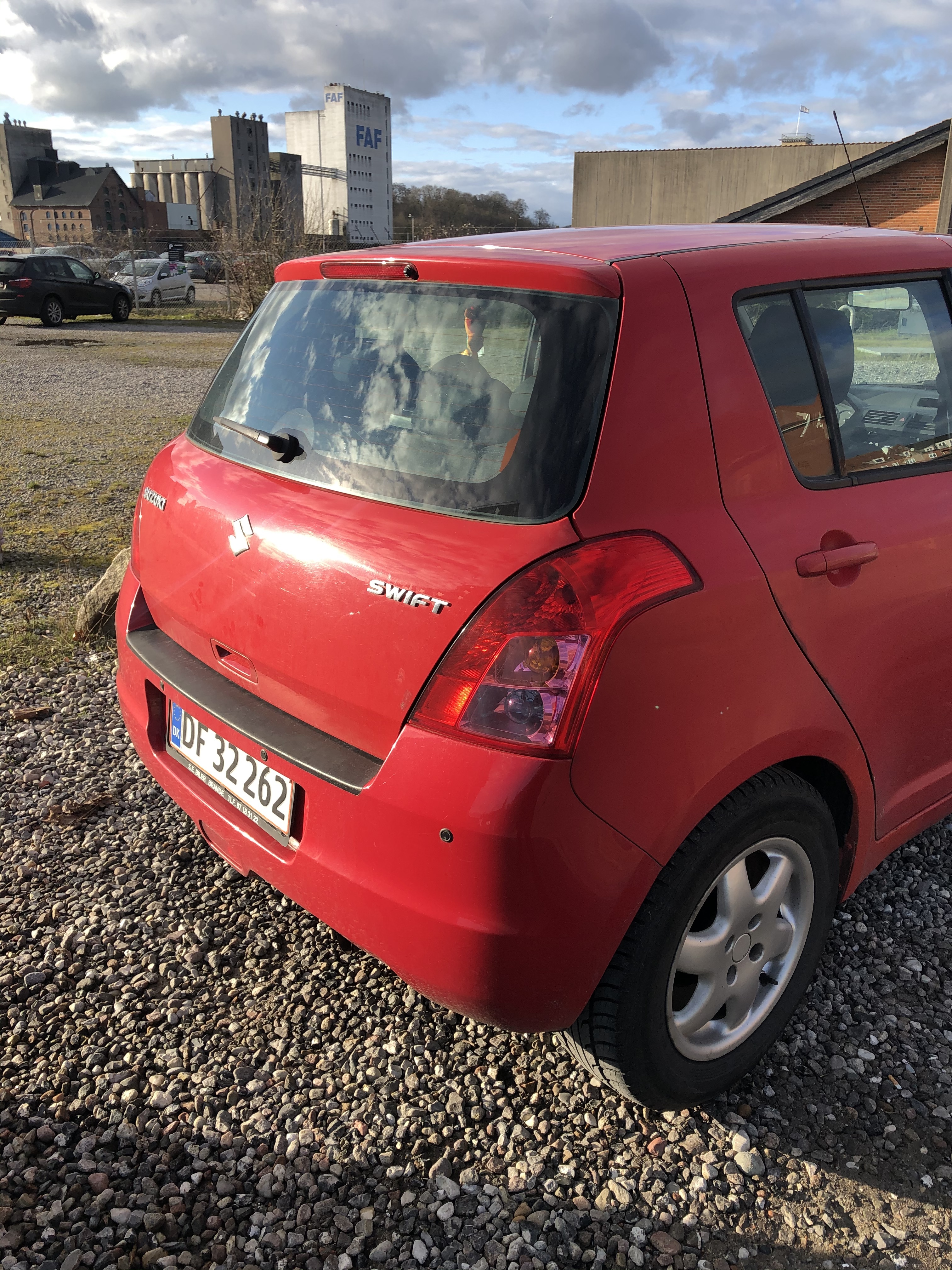 Rød Suzuki Swift fra 2008