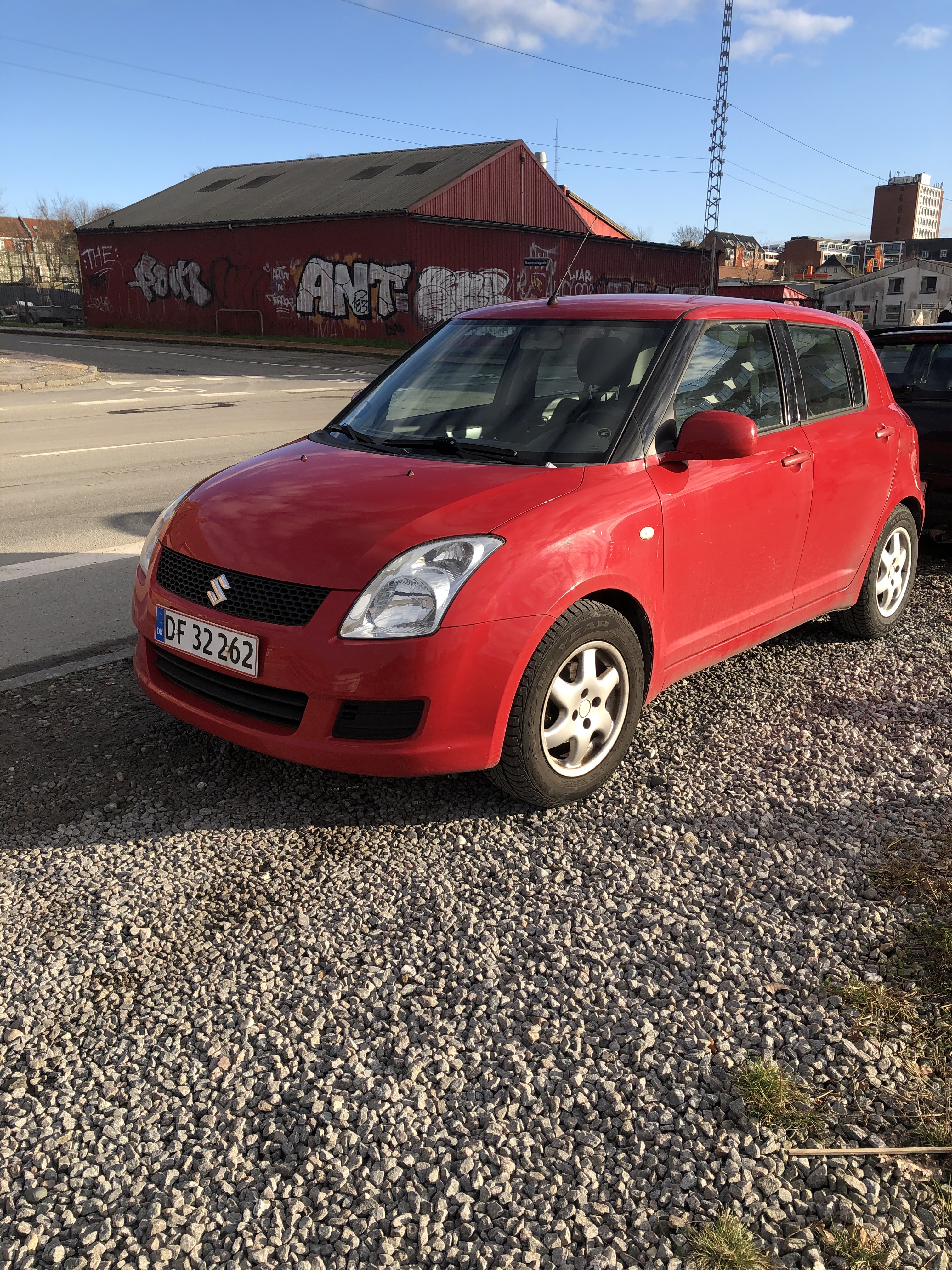 Rød Suzuki Swift fra 2008