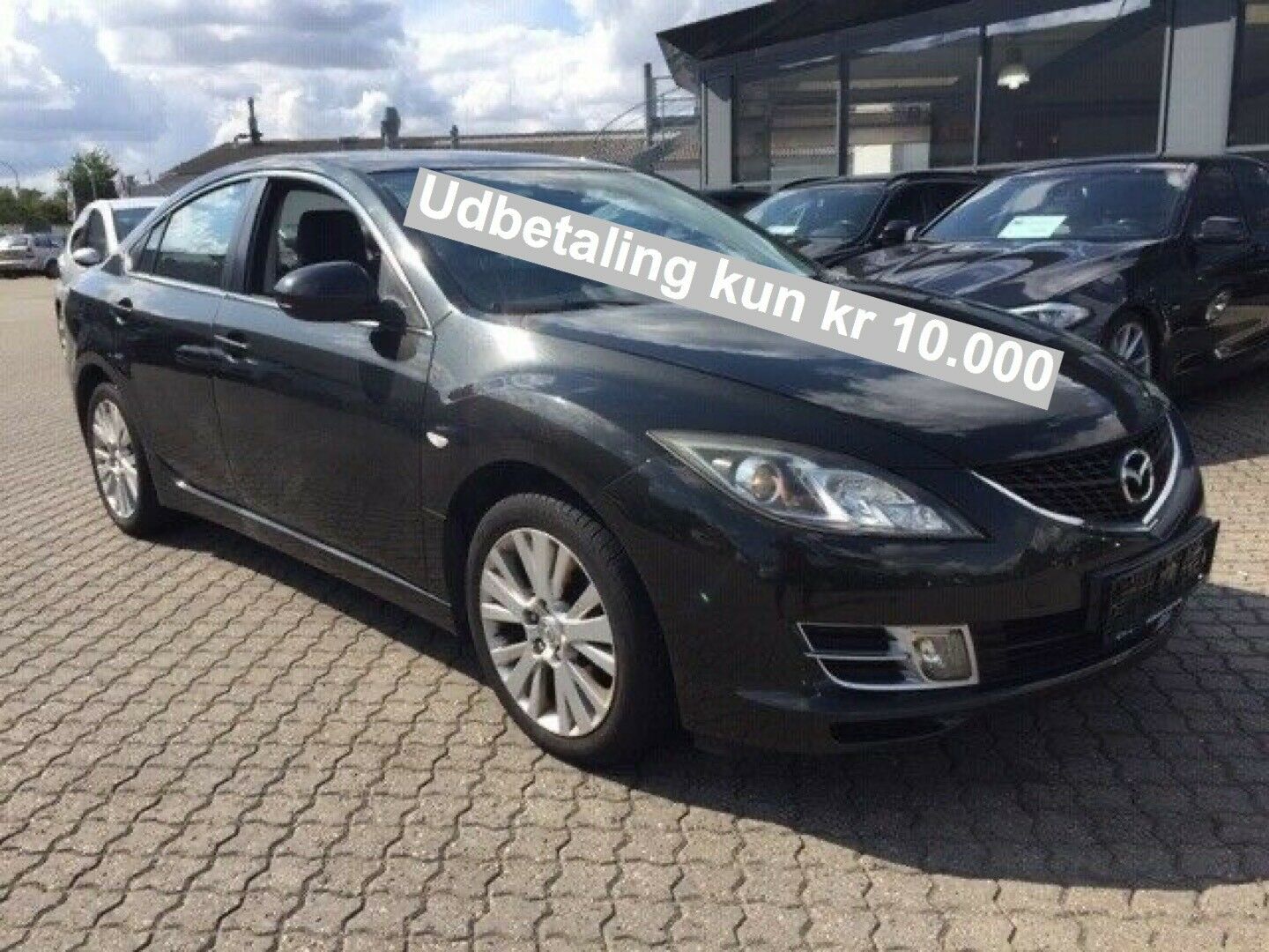 Grå Mazda 6 fra 2009