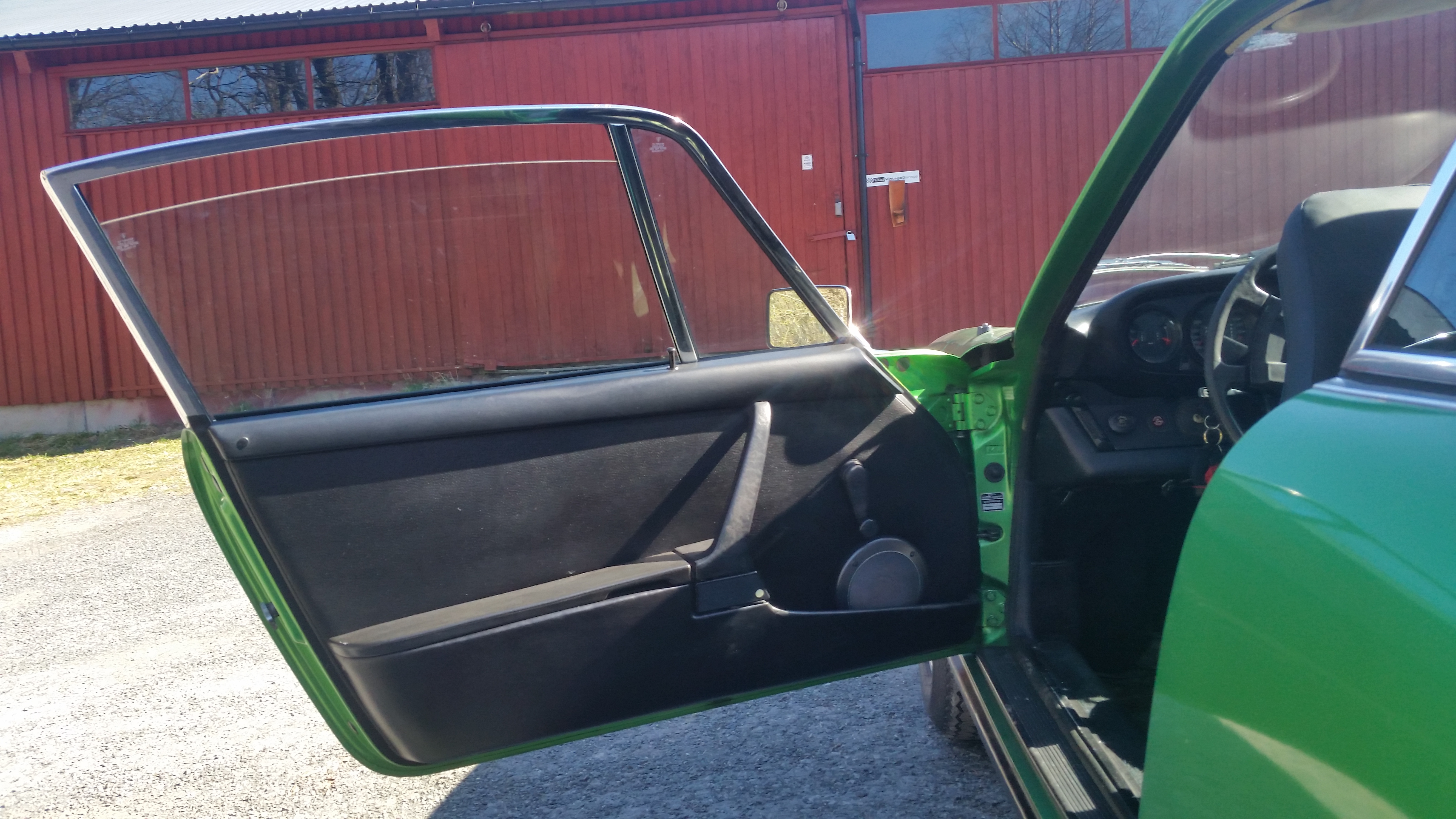 Grøn Porsche 911 fra 1975