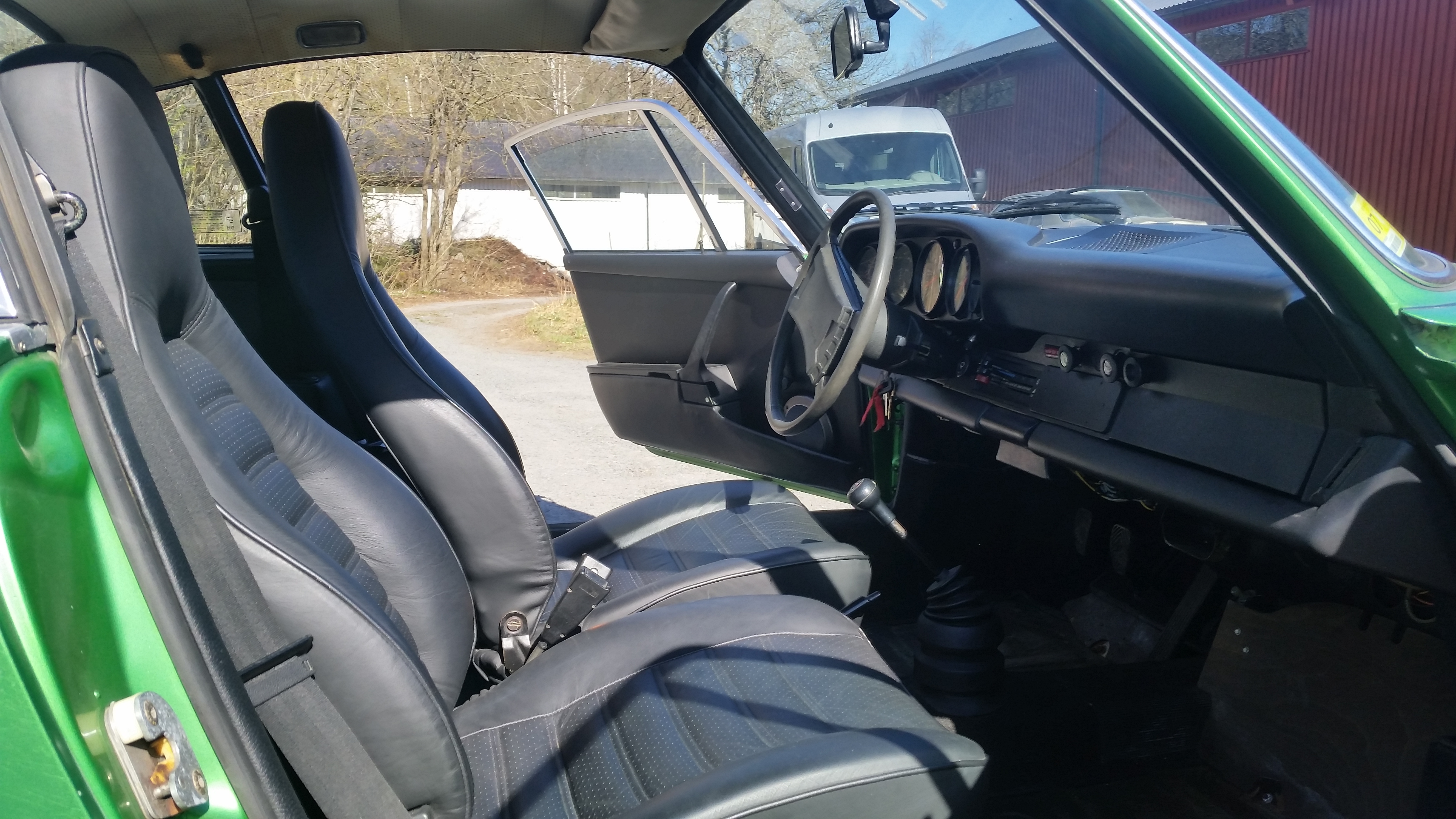 Grøn Porsche 911 fra 1975