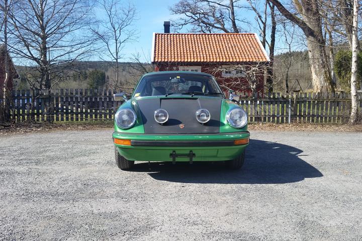 Grøn Porsche 911 fra 1975