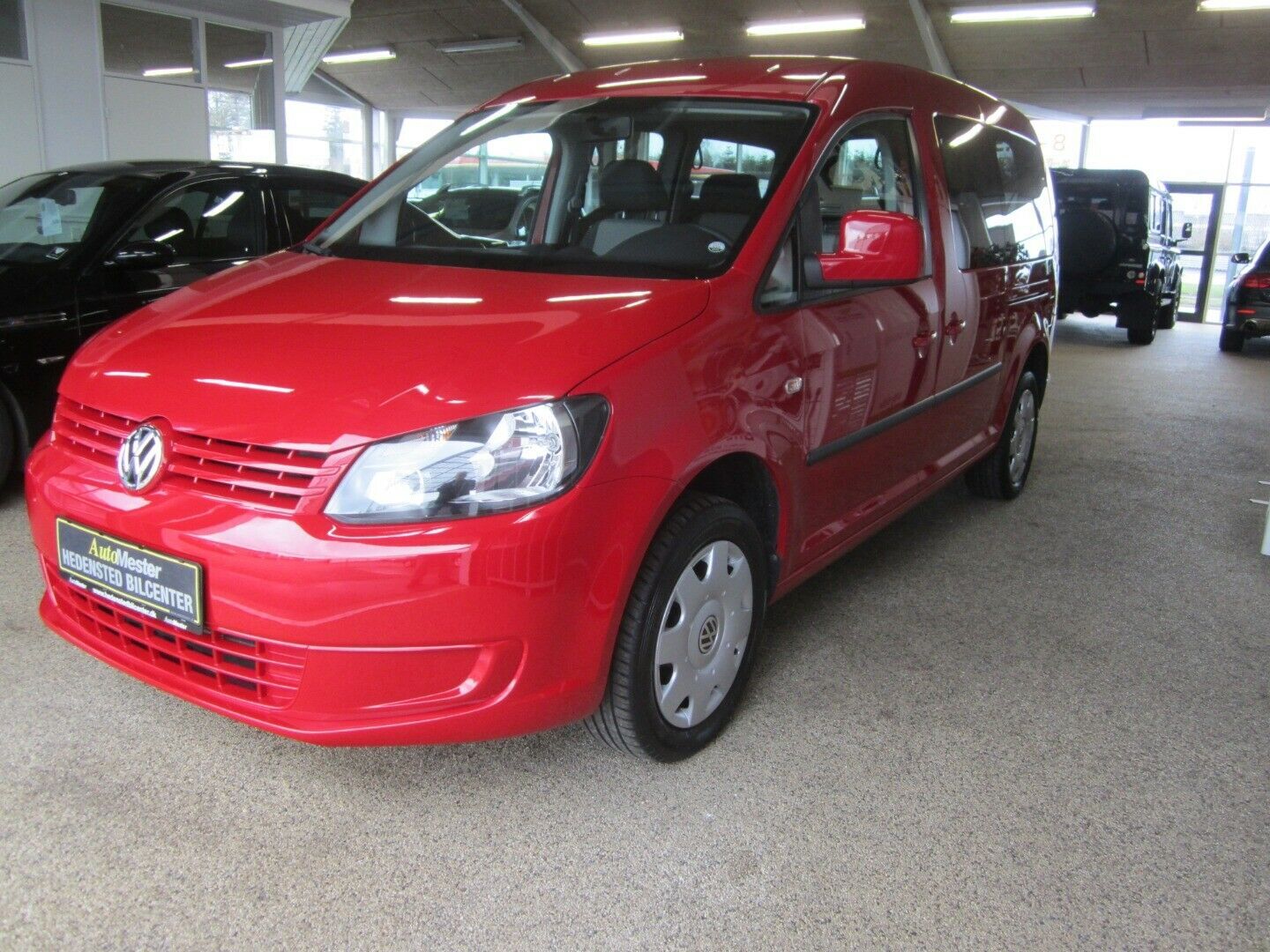 Rød VW Caddy Maxi fra 2014