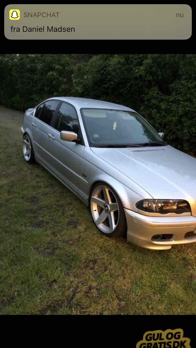 Sølv BMW 323i fra 1999