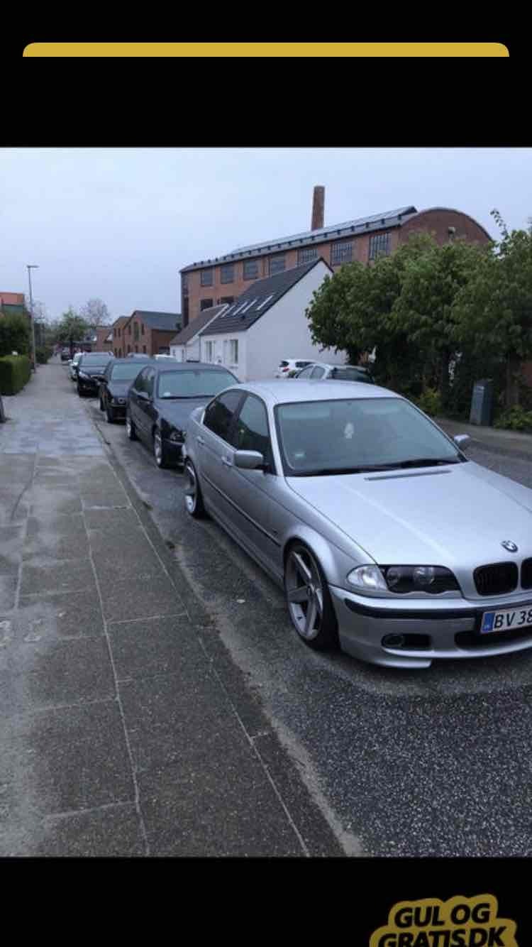 Sølv BMW 323i fra 1999