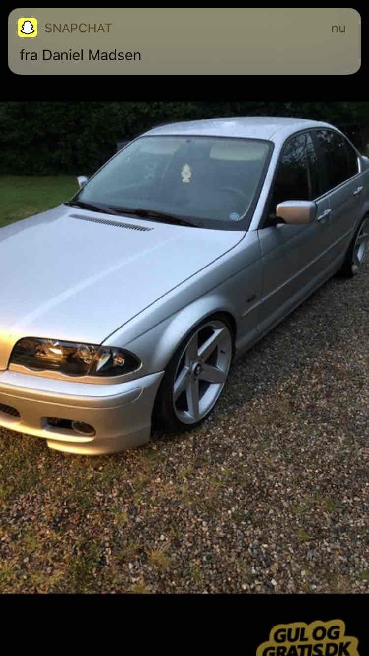 Sølv BMW 323i fra 1999