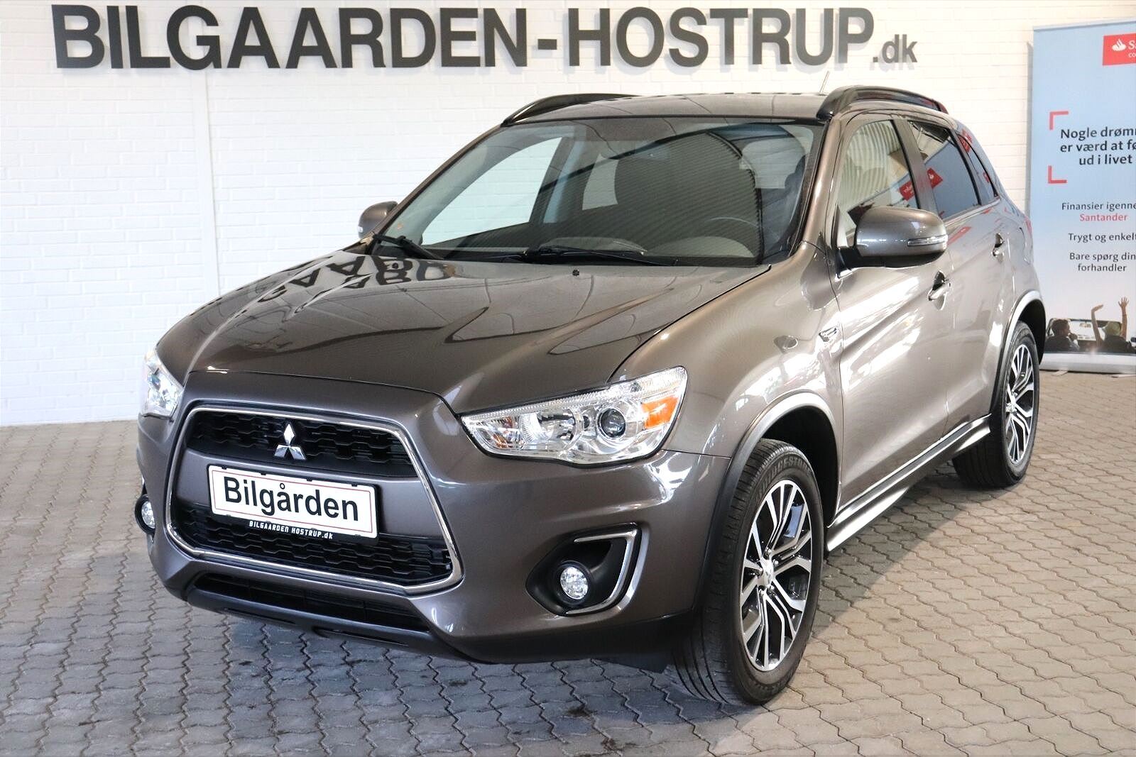 Brun Mitsubishi Colt fra 2009