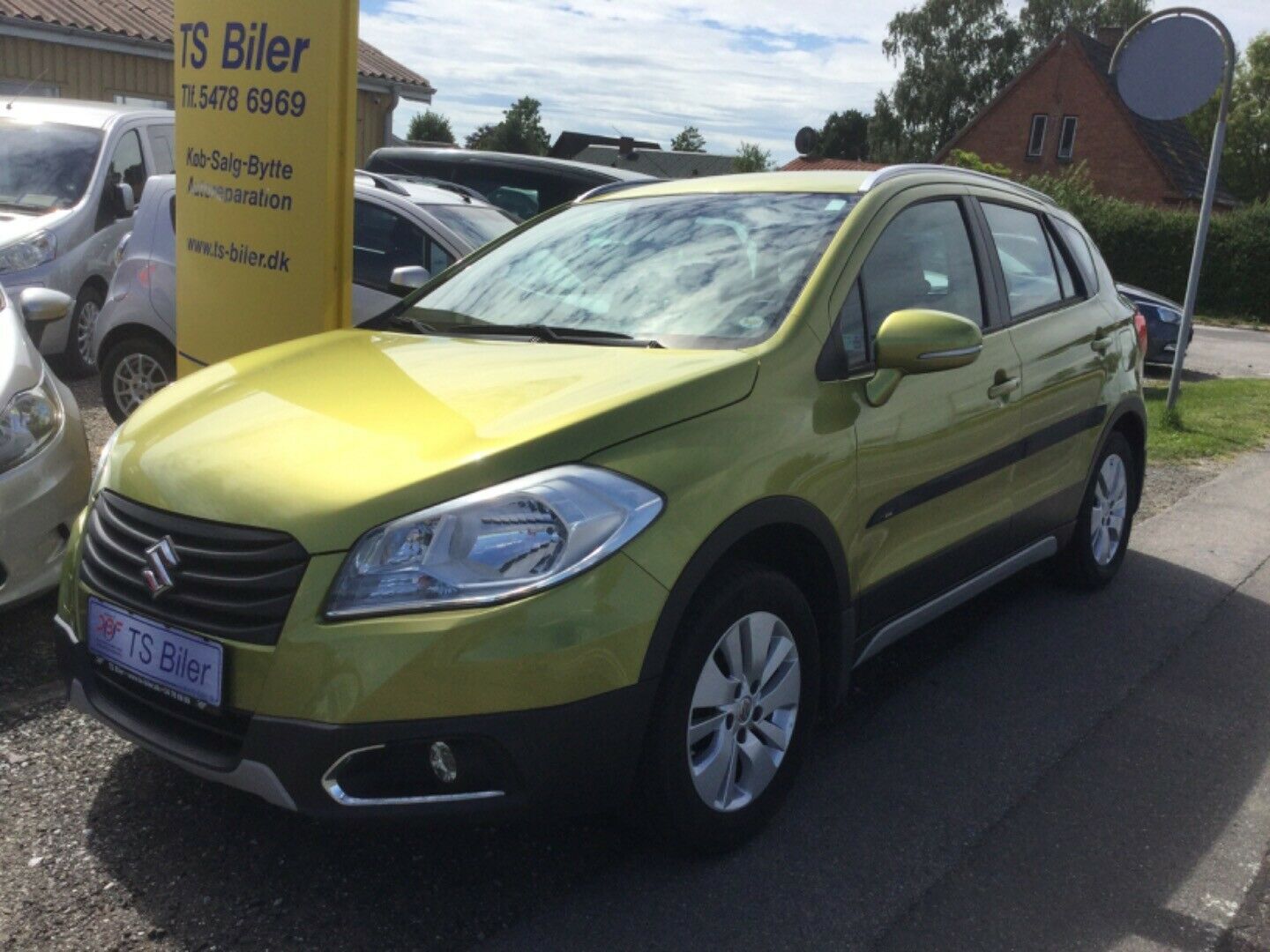 Grøn Suzuki S-Cross fra 2013