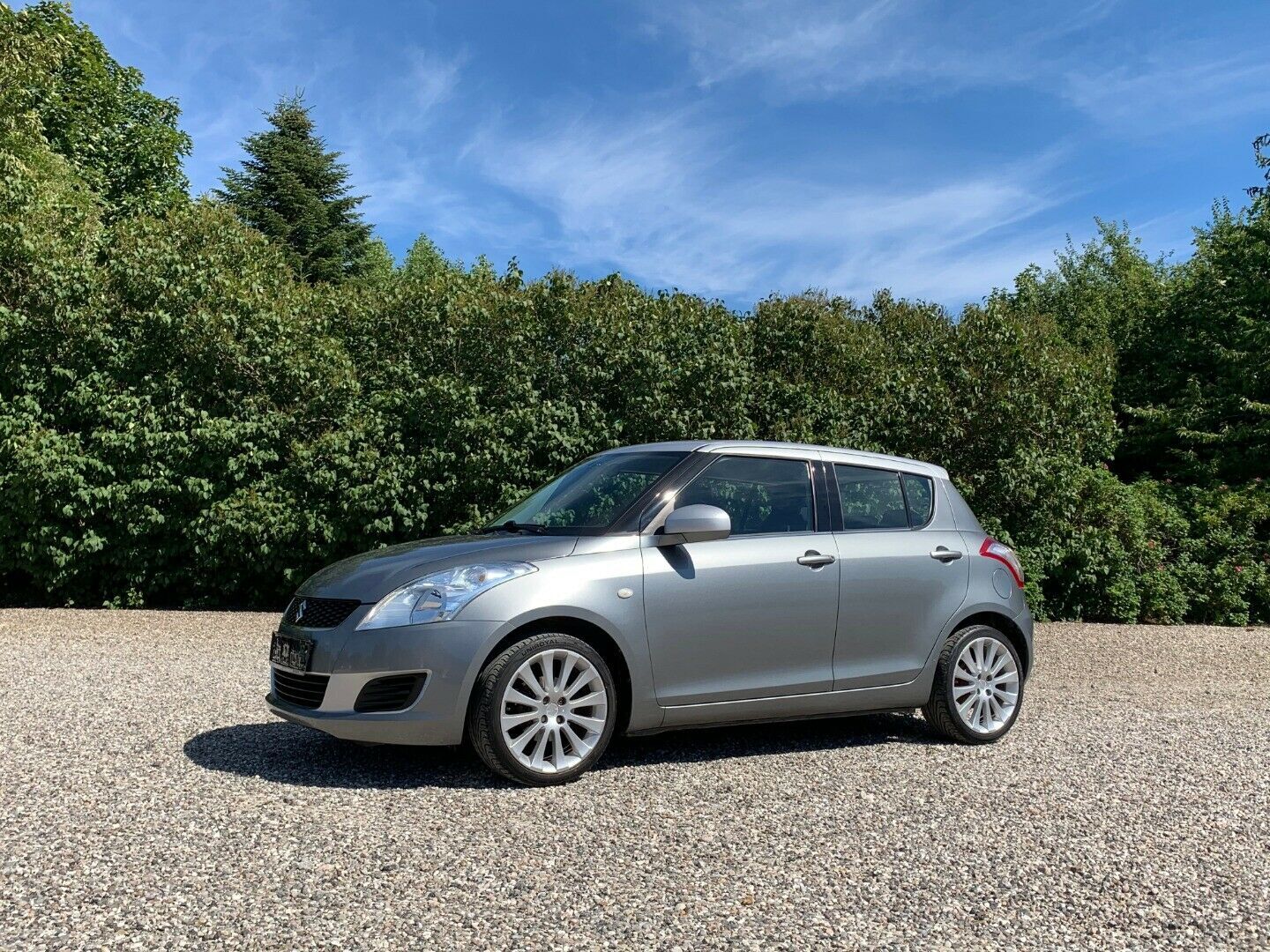 Grå Suzuki Swift fra 2011