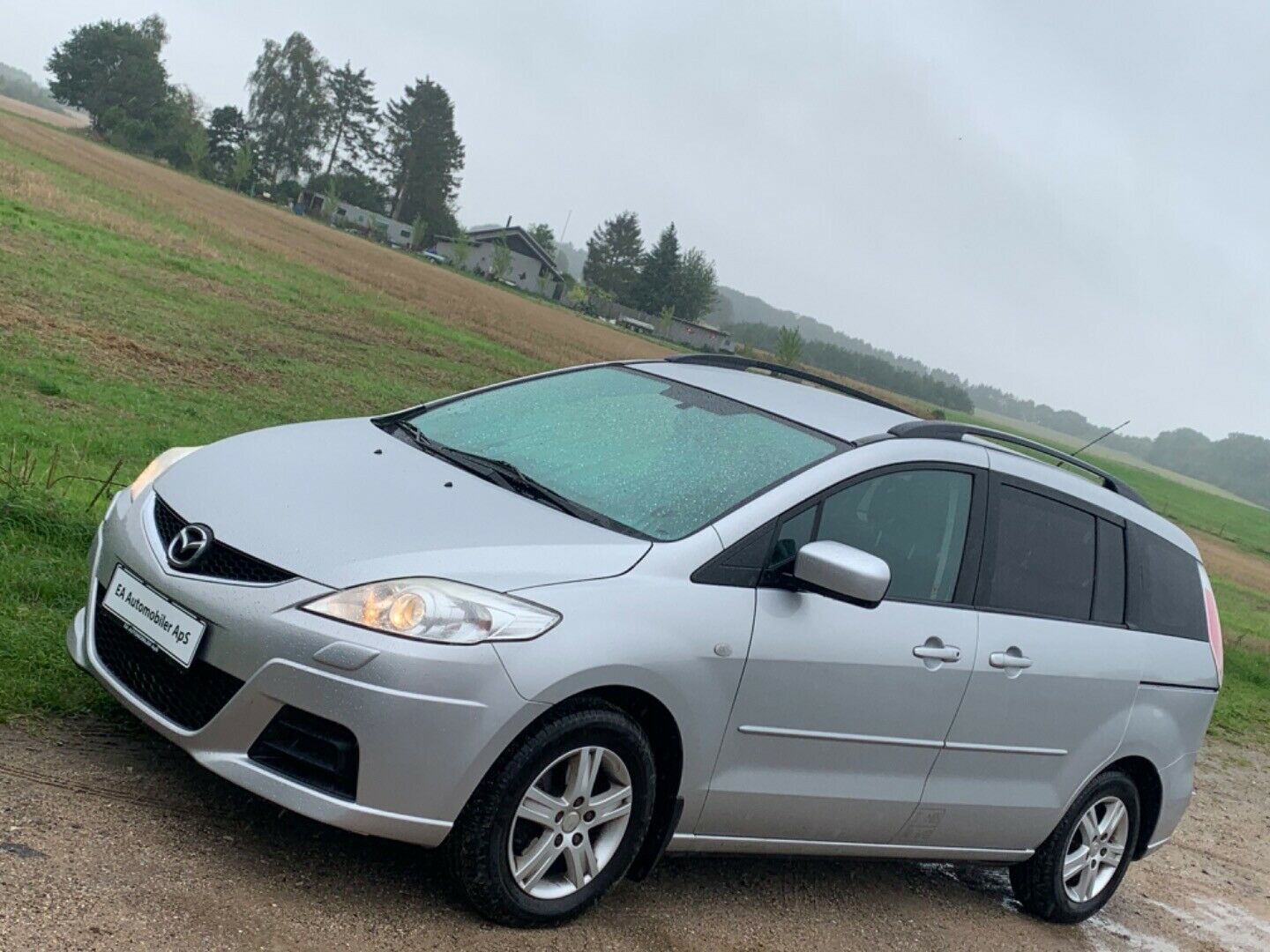 Grå Mazda 5 fra 2009