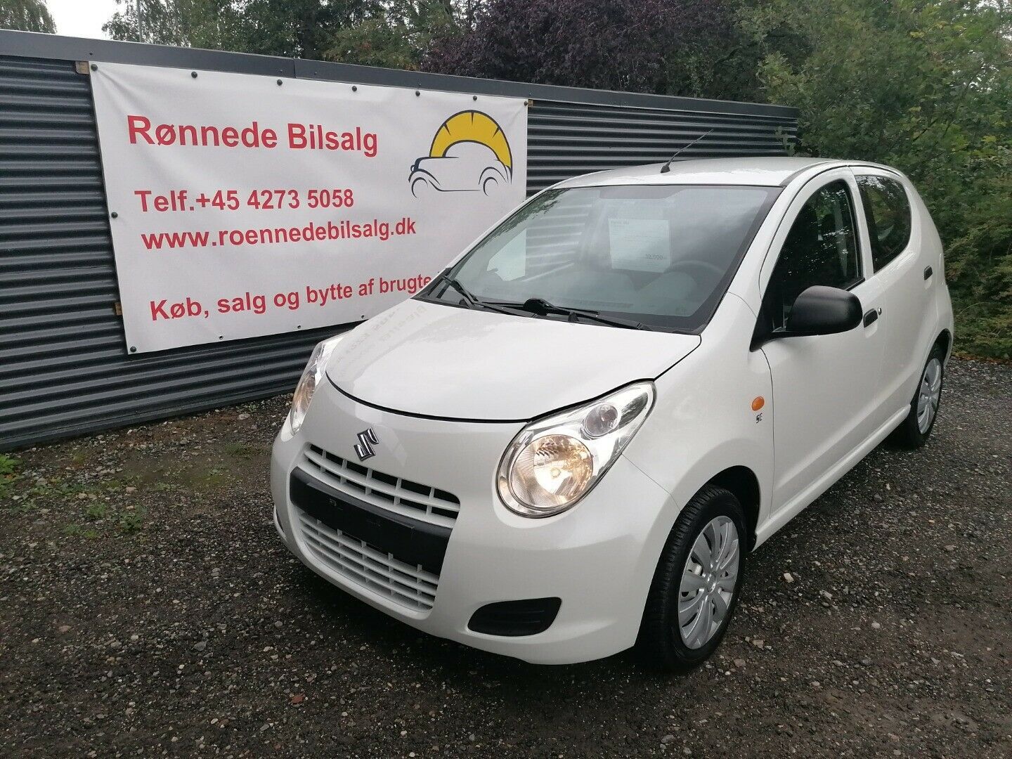 Grå Suzuki Alto fra 2011