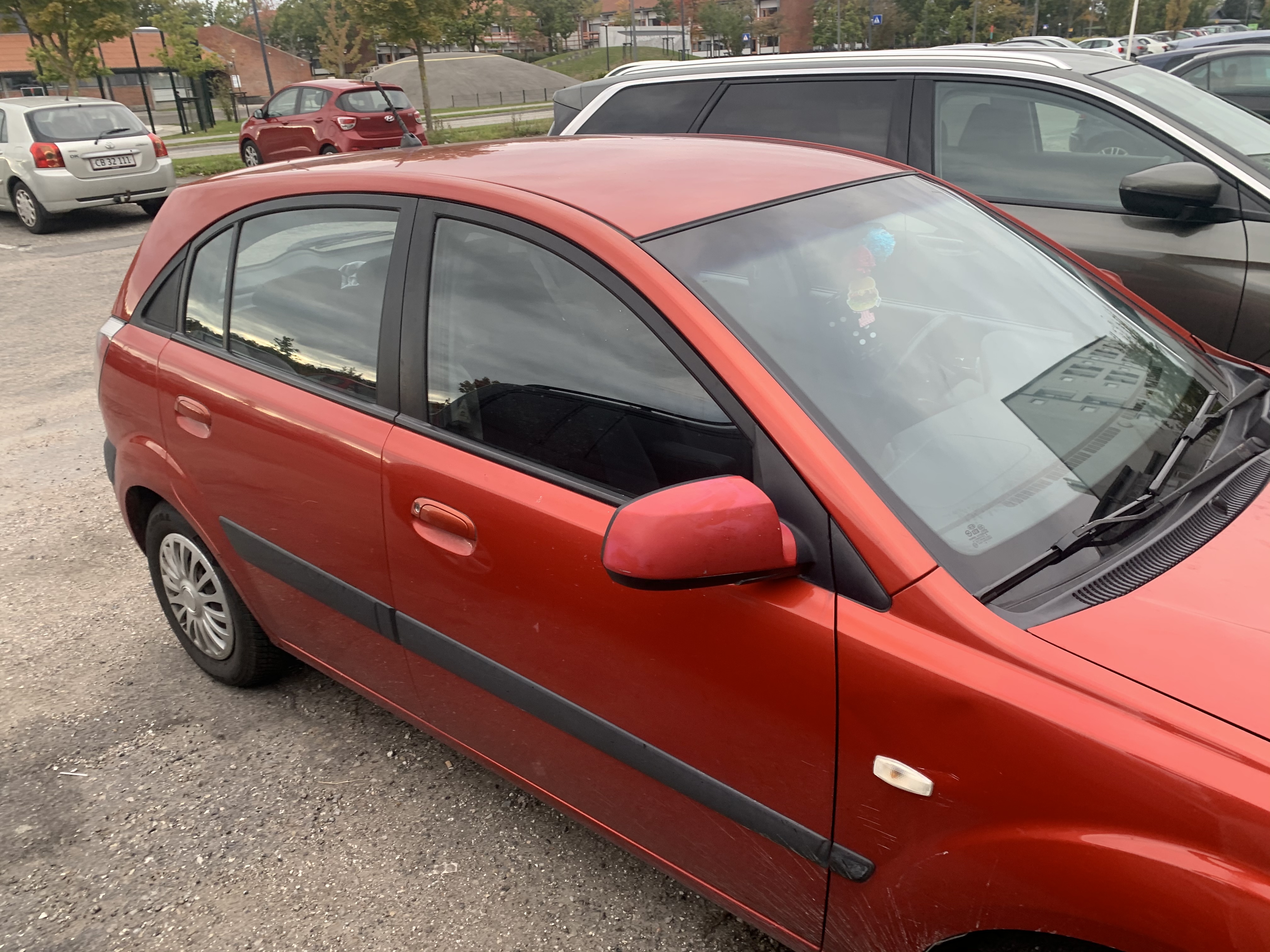 Rød Kia Rio fra 2007
