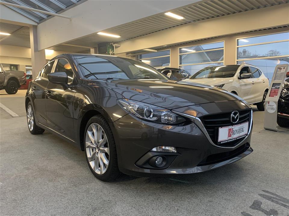 Brun Mazda 3 fra 2015