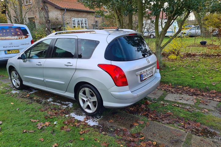 Sølv Peugeot 308 fra 2009