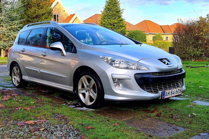 Sølv Peugeot 308 fra 2009
