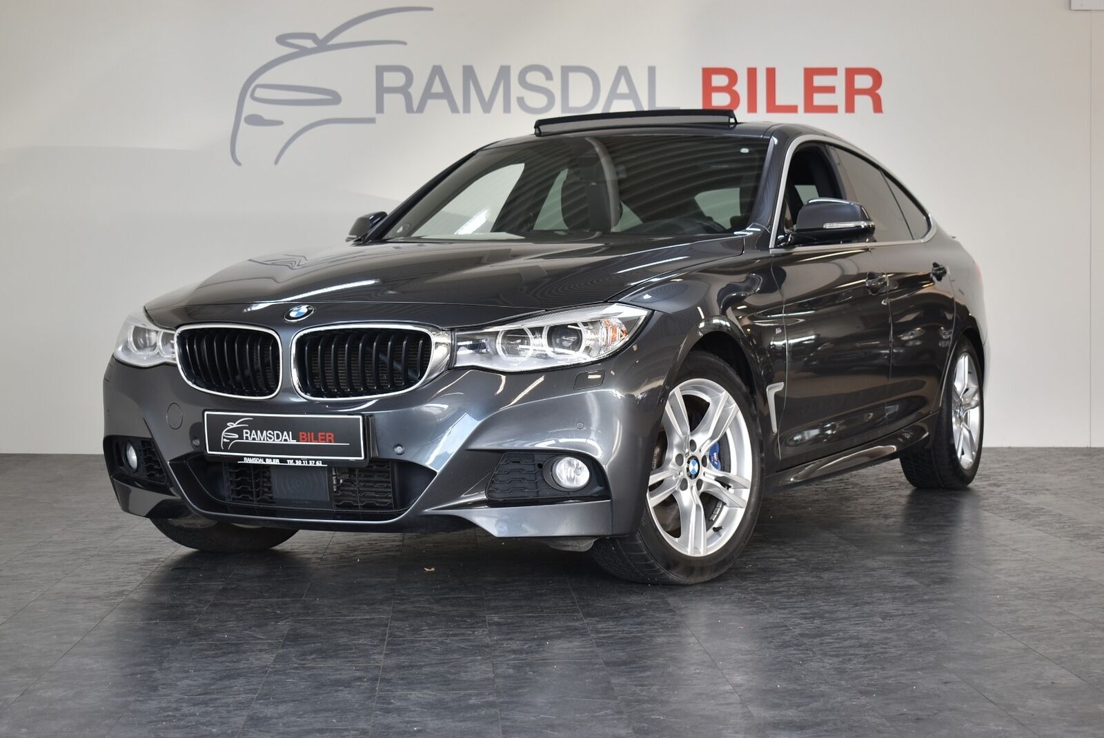 Grå BMW 335i fra 2014