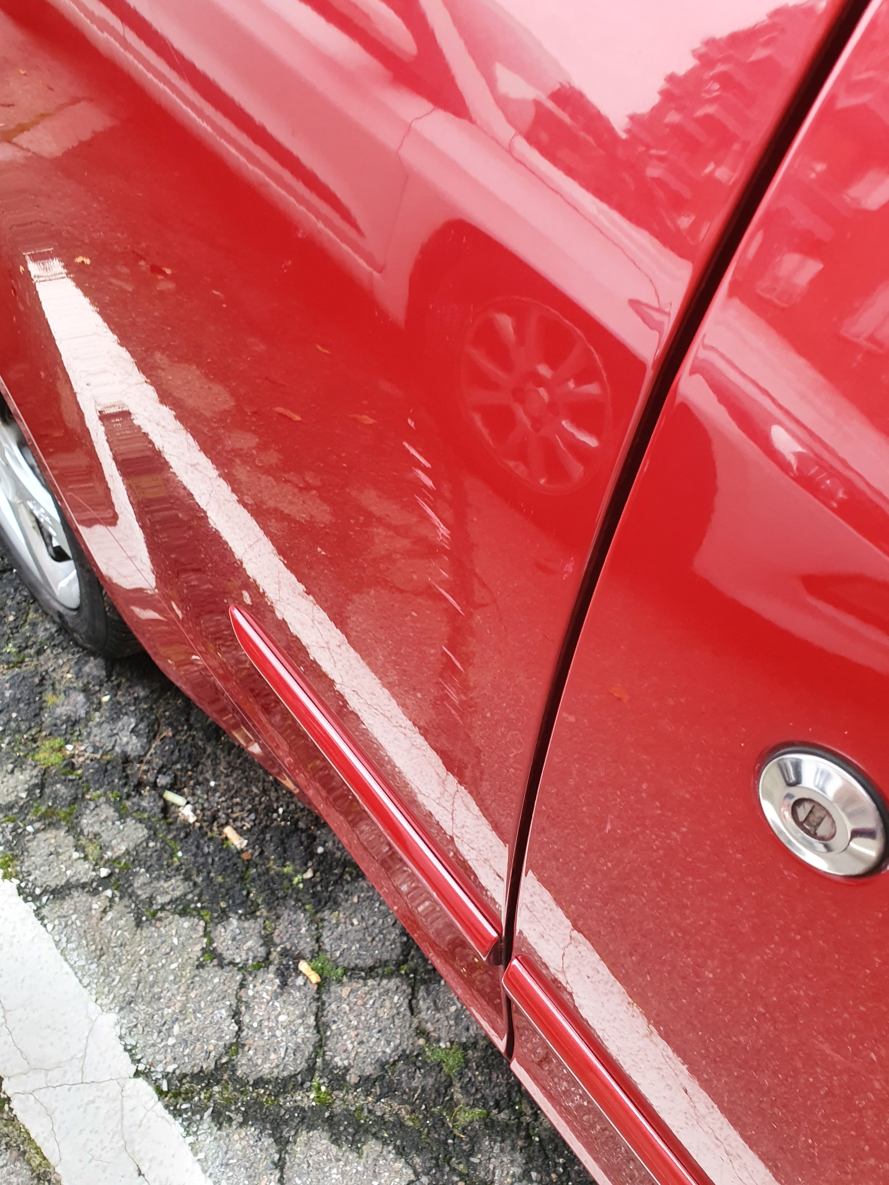 Rød Mitsubishi Colt fra 2008