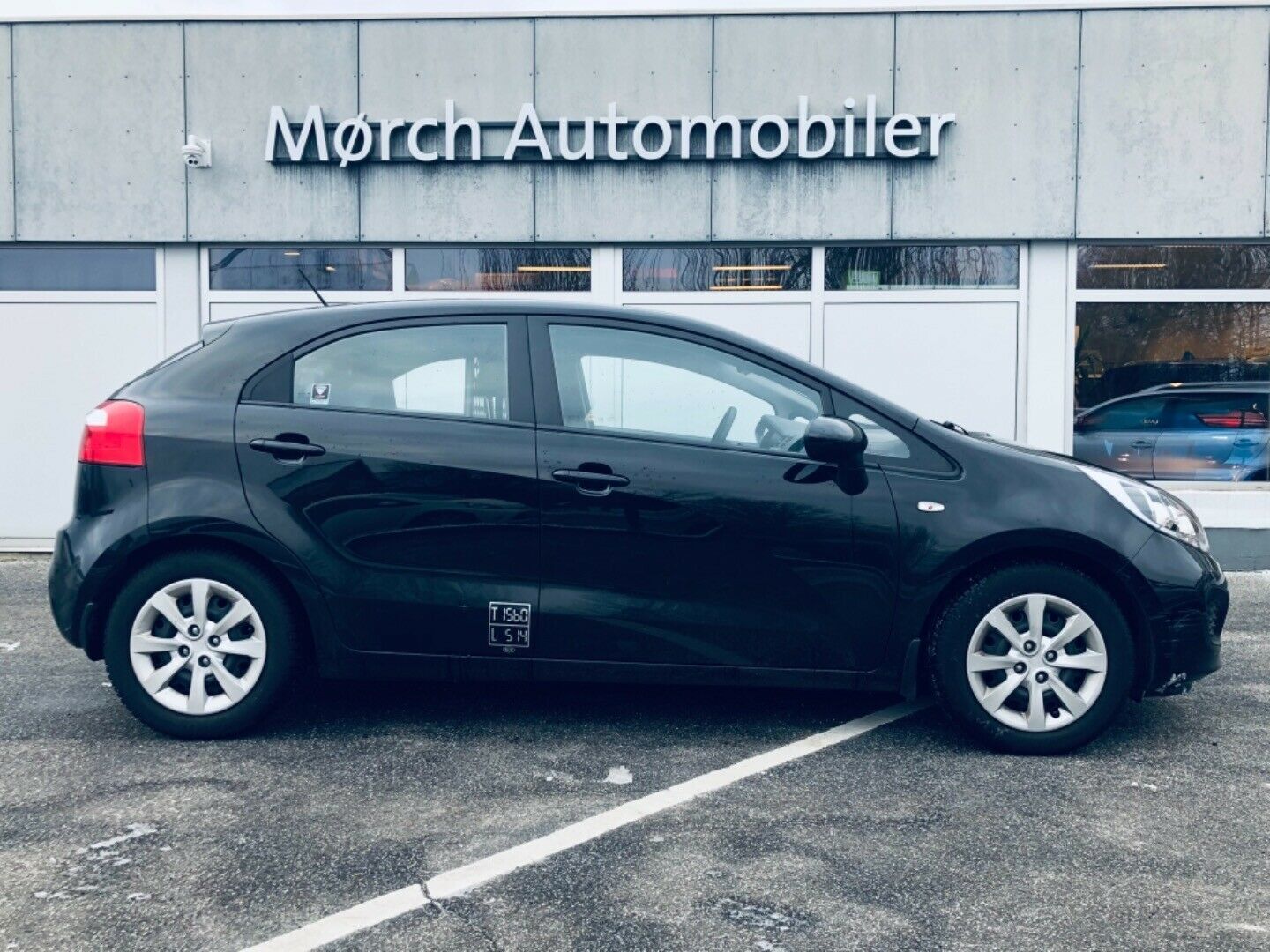 Grå Kia Rio fra 2012