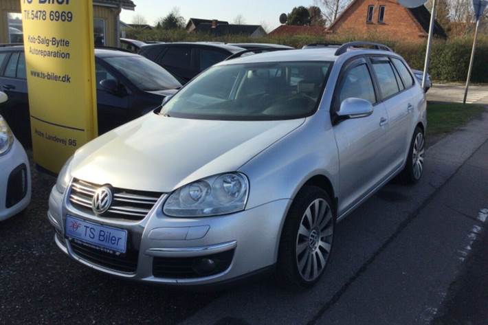 Grå VW Golf V fra 2009