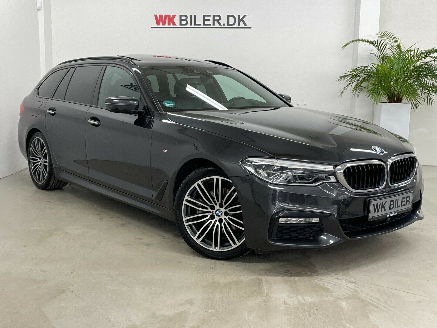Grå BMW 520d fra 2018