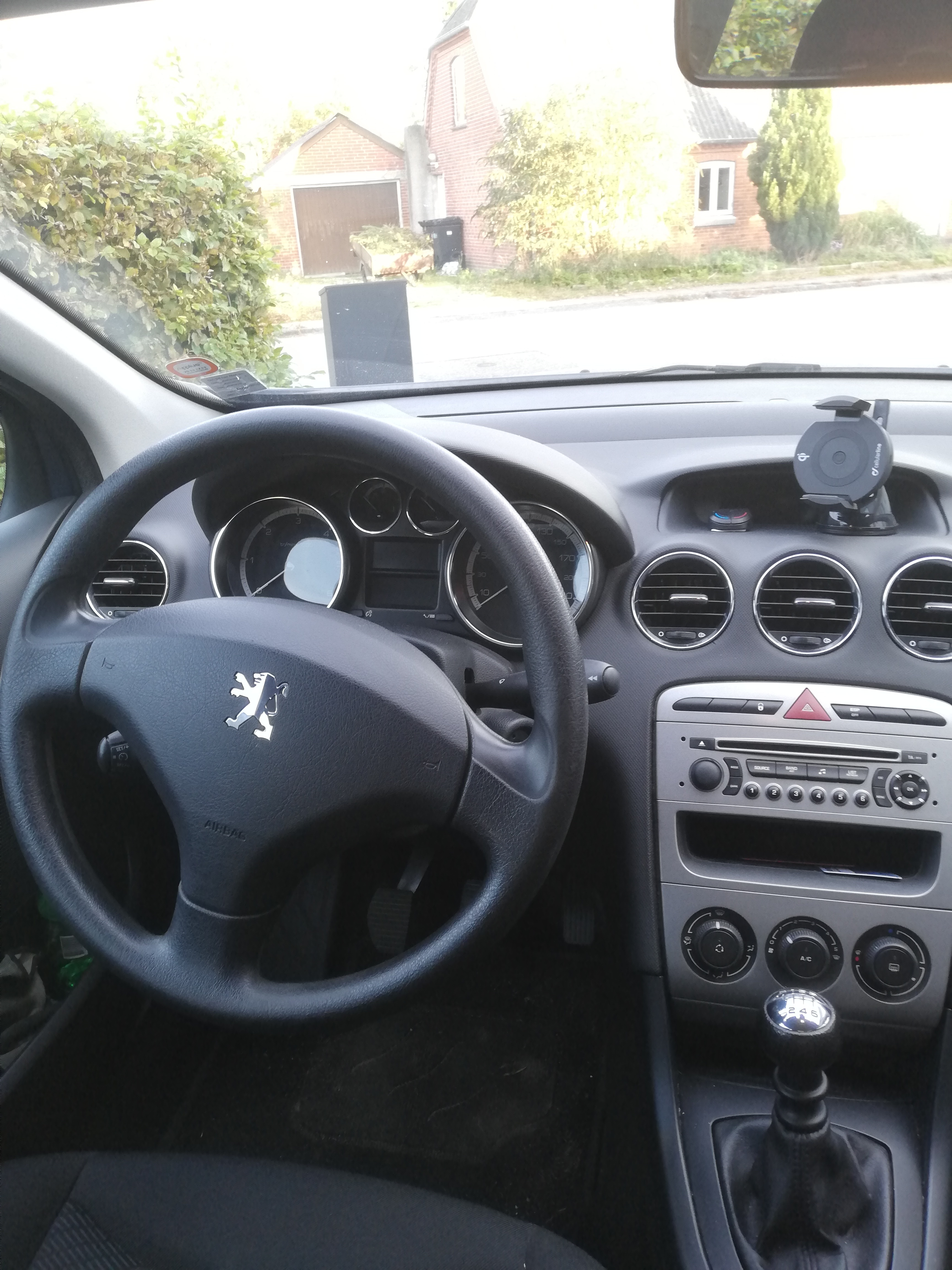 Blå Peugeot 308 fra 2009