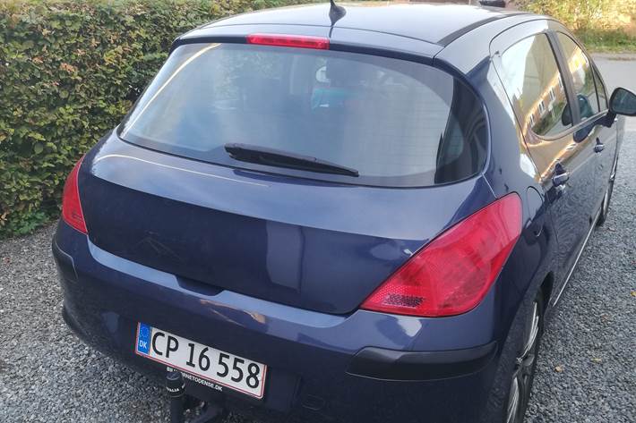Blå Peugeot 308 fra 2009