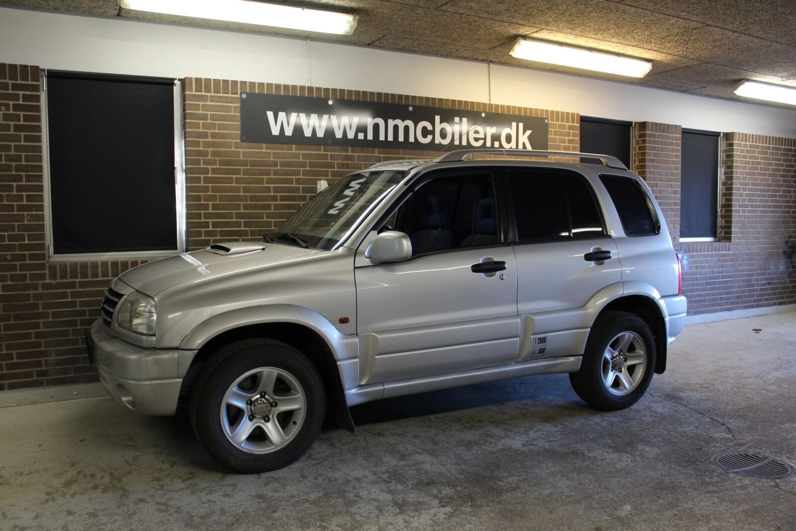 Gul Suzuki Grand Vitara fra 2003