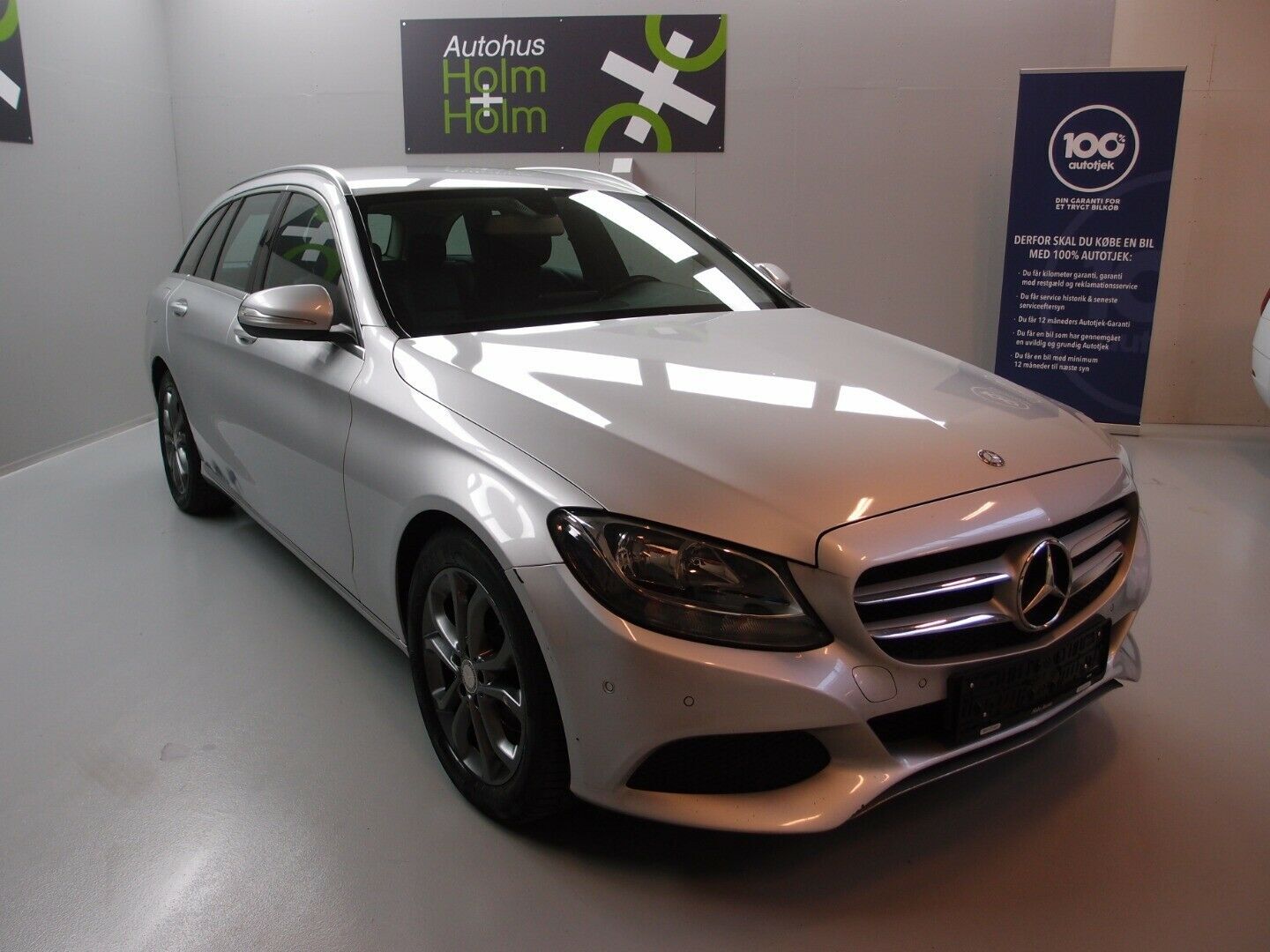Grå Mercedes C180 d fra 2015