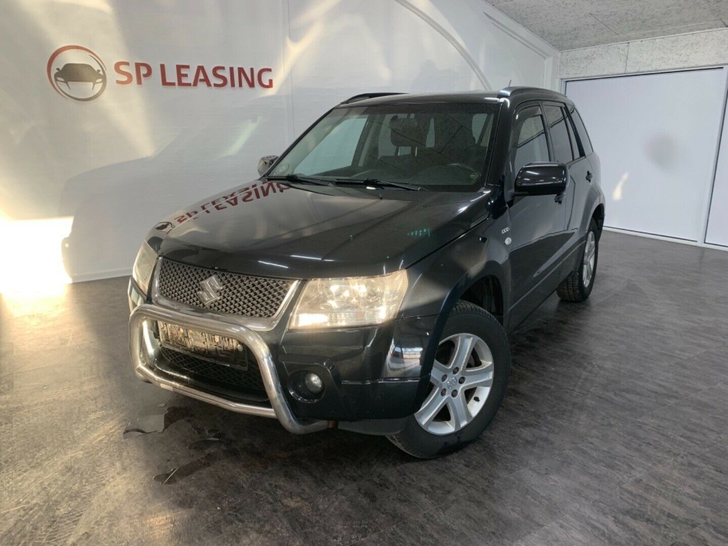 Gul Suzuki Grand Vitara fra 2006