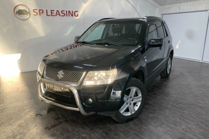 Gul Suzuki Grand Vitara fra 2006