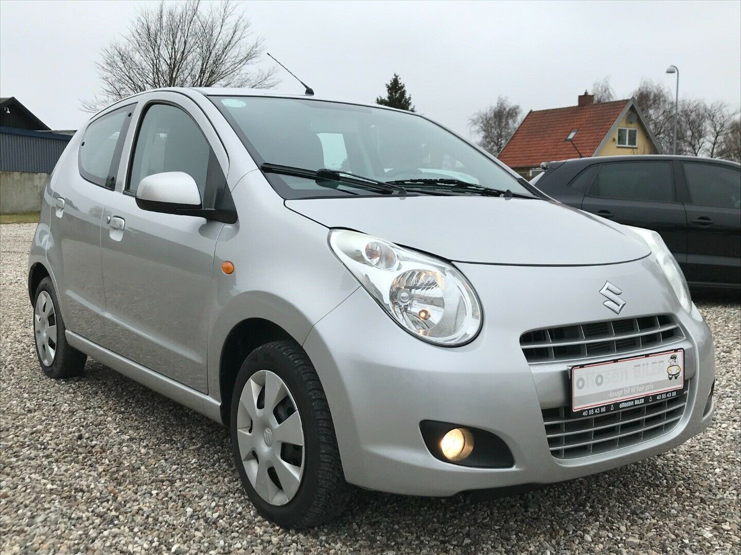 Grå Suzuki Alto fra 2012