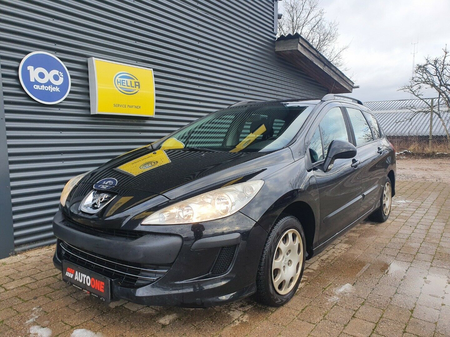 Grå Peugeot 308 fra 2009