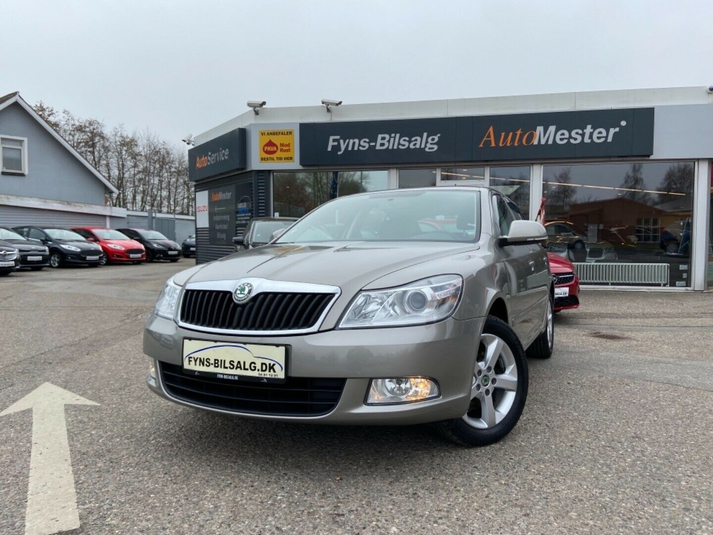 Grå Skoda Octavia fra 2011