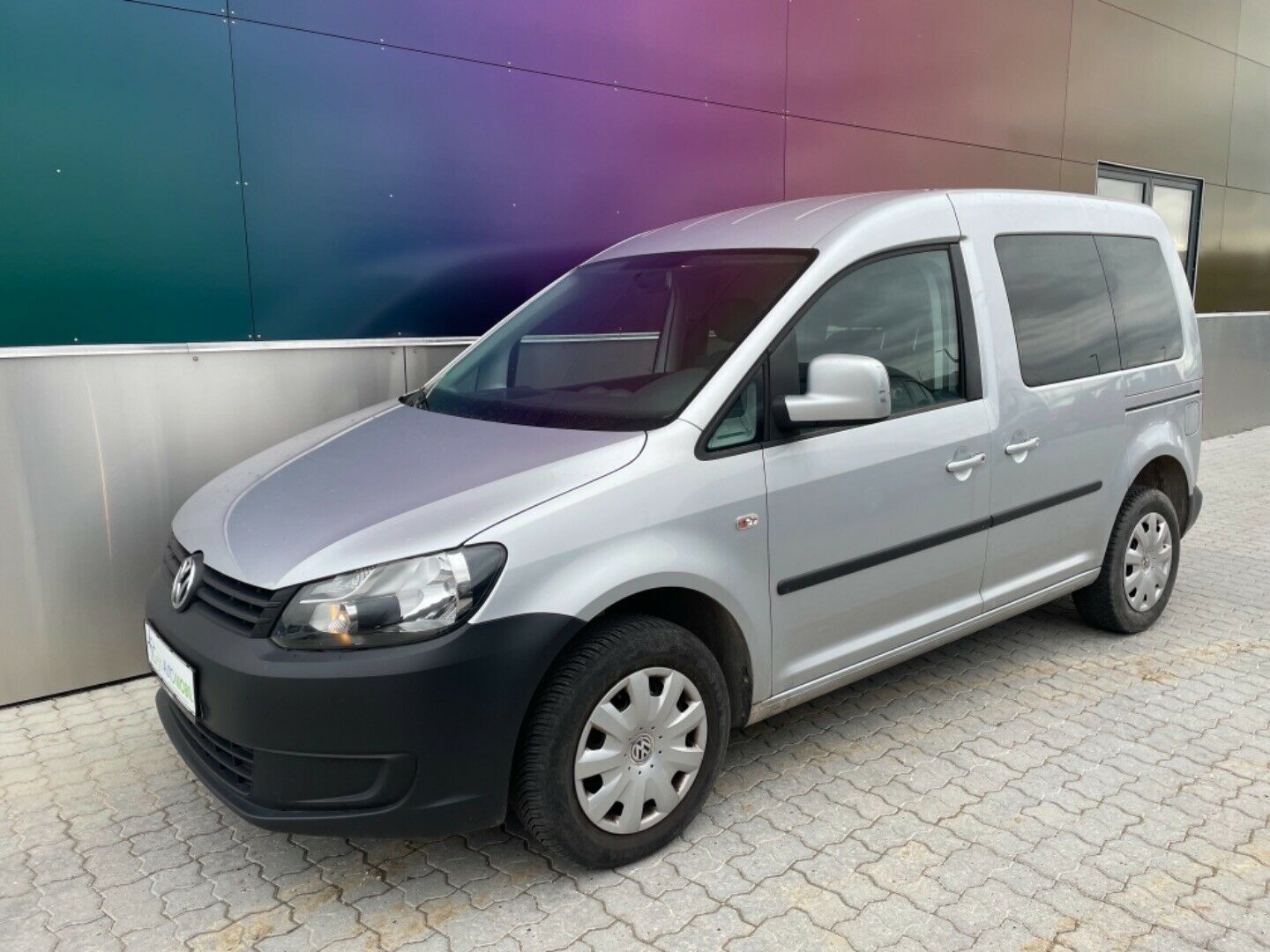Grå VW Caddy fra 2011