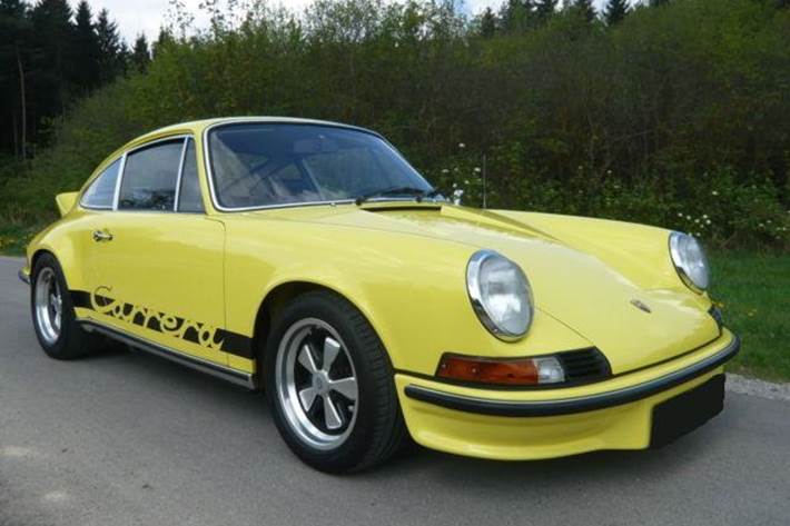 Gul Porsche 911 Carrera fra 1973
