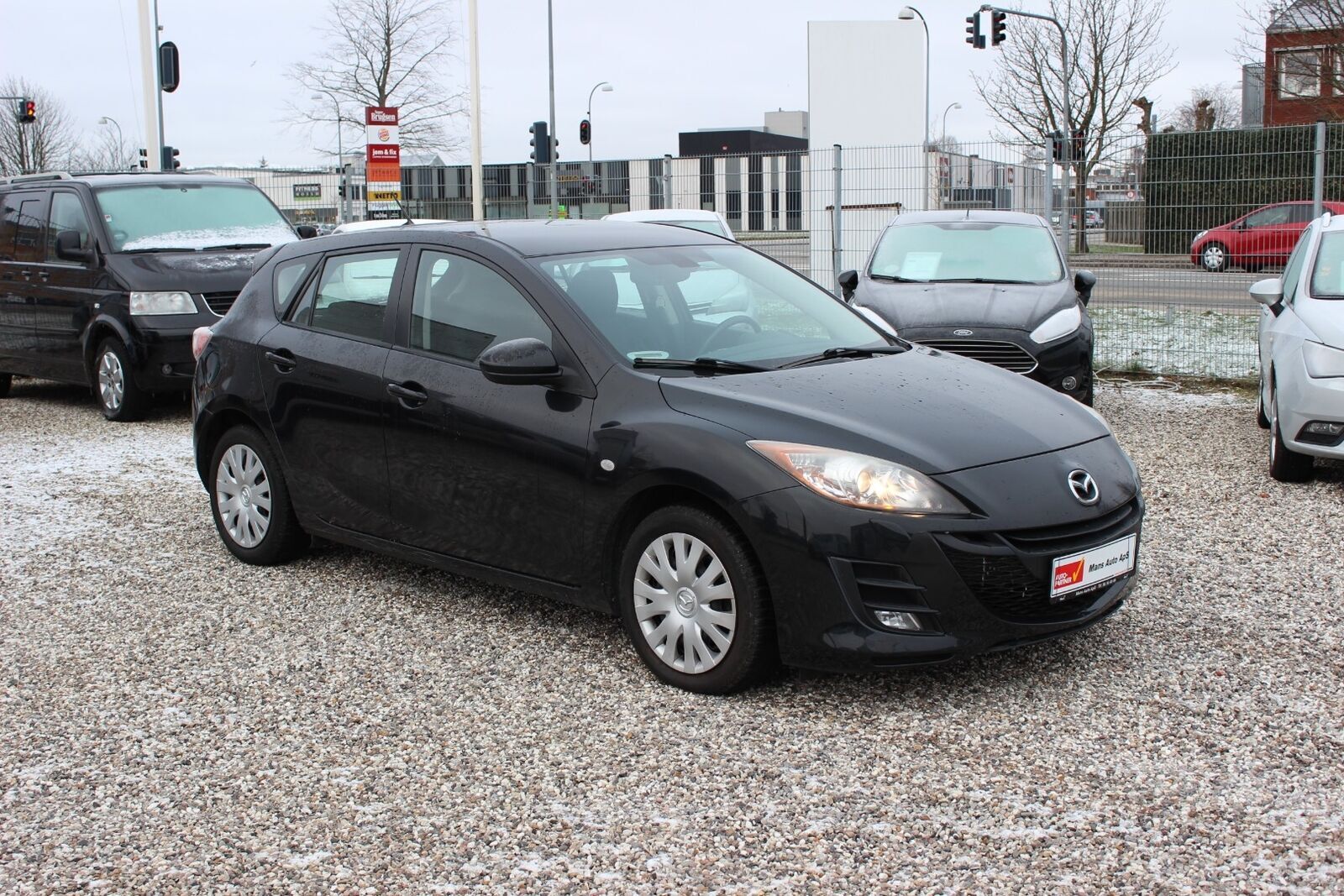 Grå Mazda 3 fra 2011
