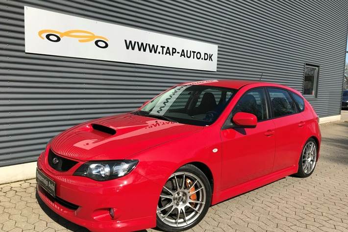 Rød Subaru Impreza fra 2008