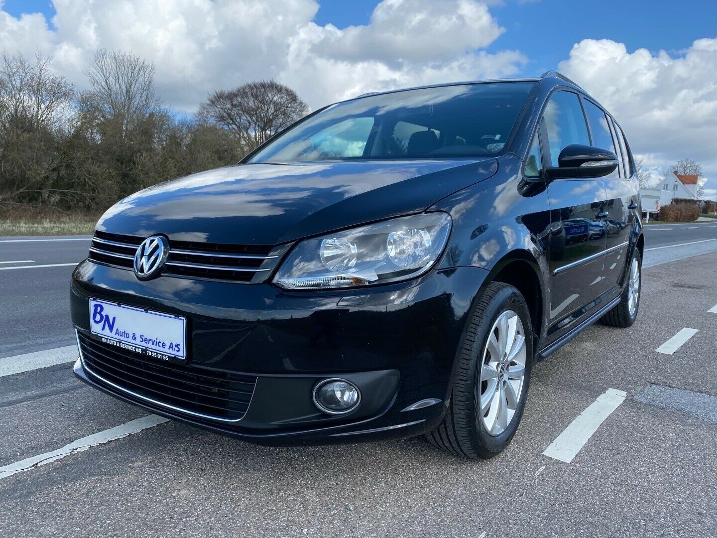 Grå VW Touran fra 2012