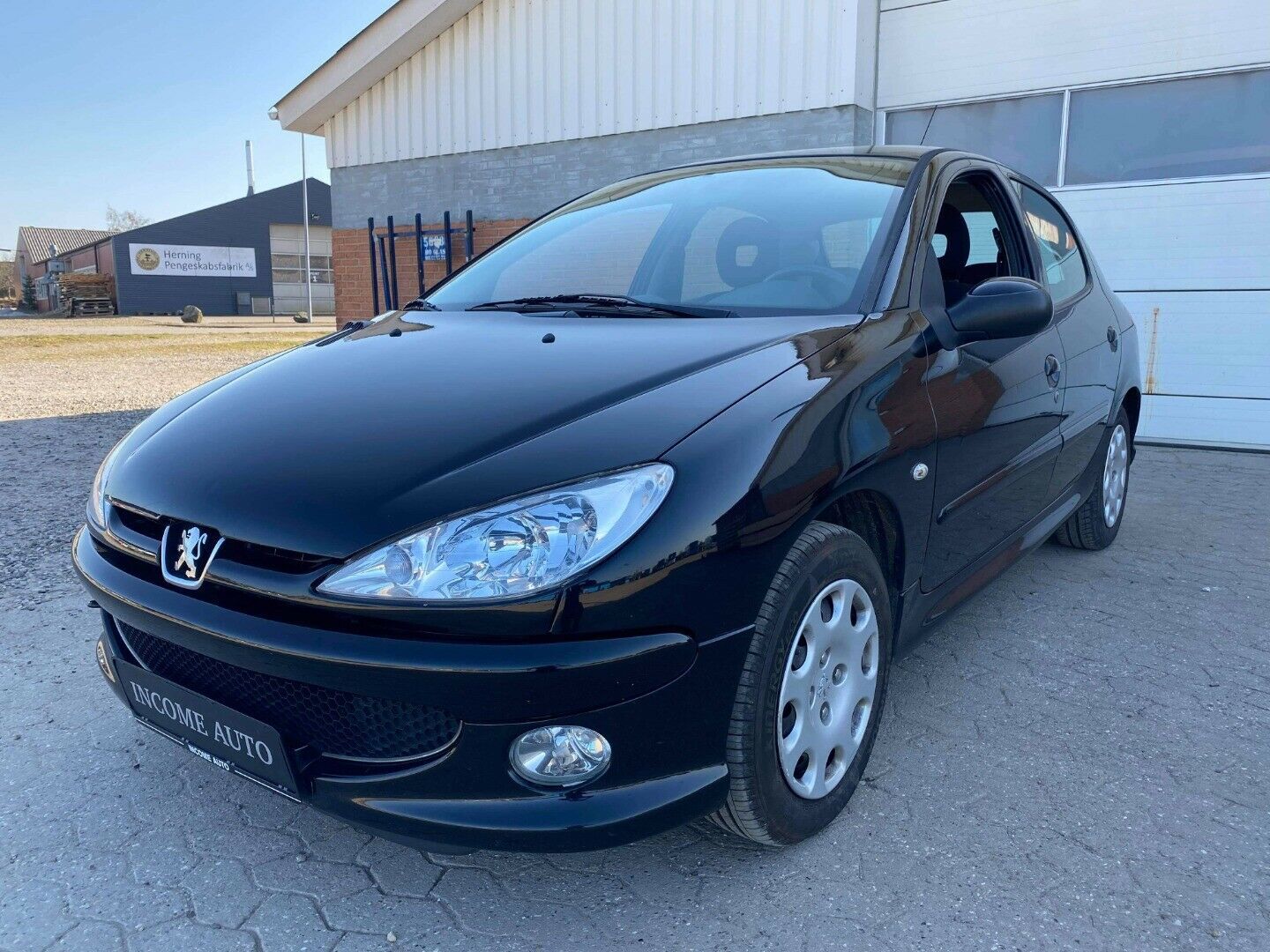Grå Peugeot 206 fra 2008
