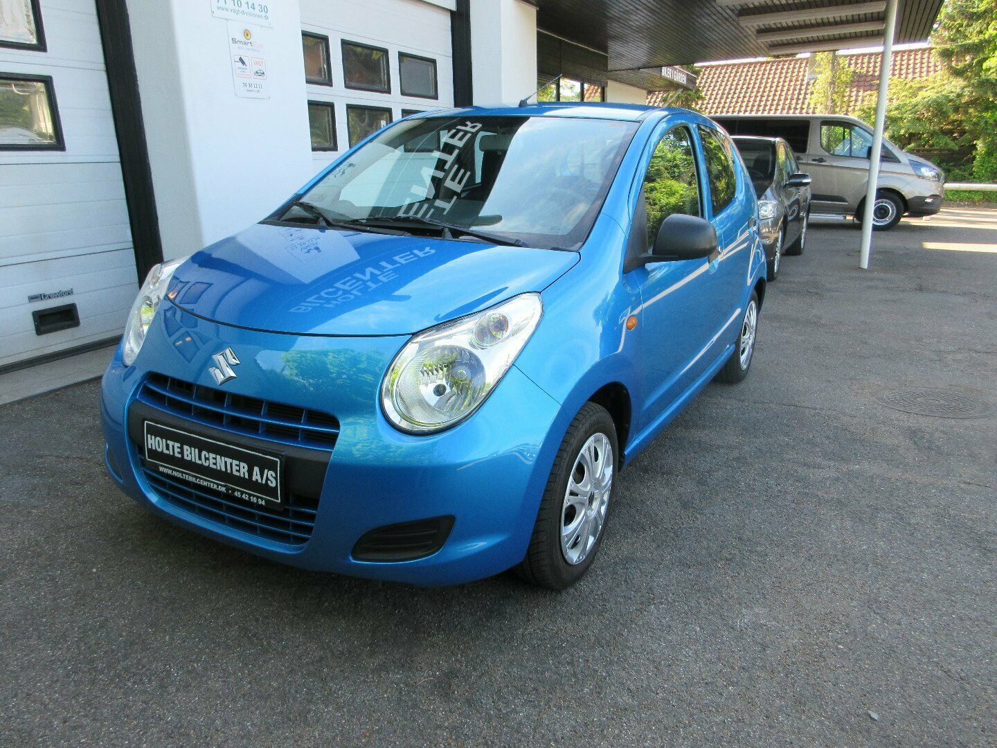 Blå Suzuki Alto fra 2013