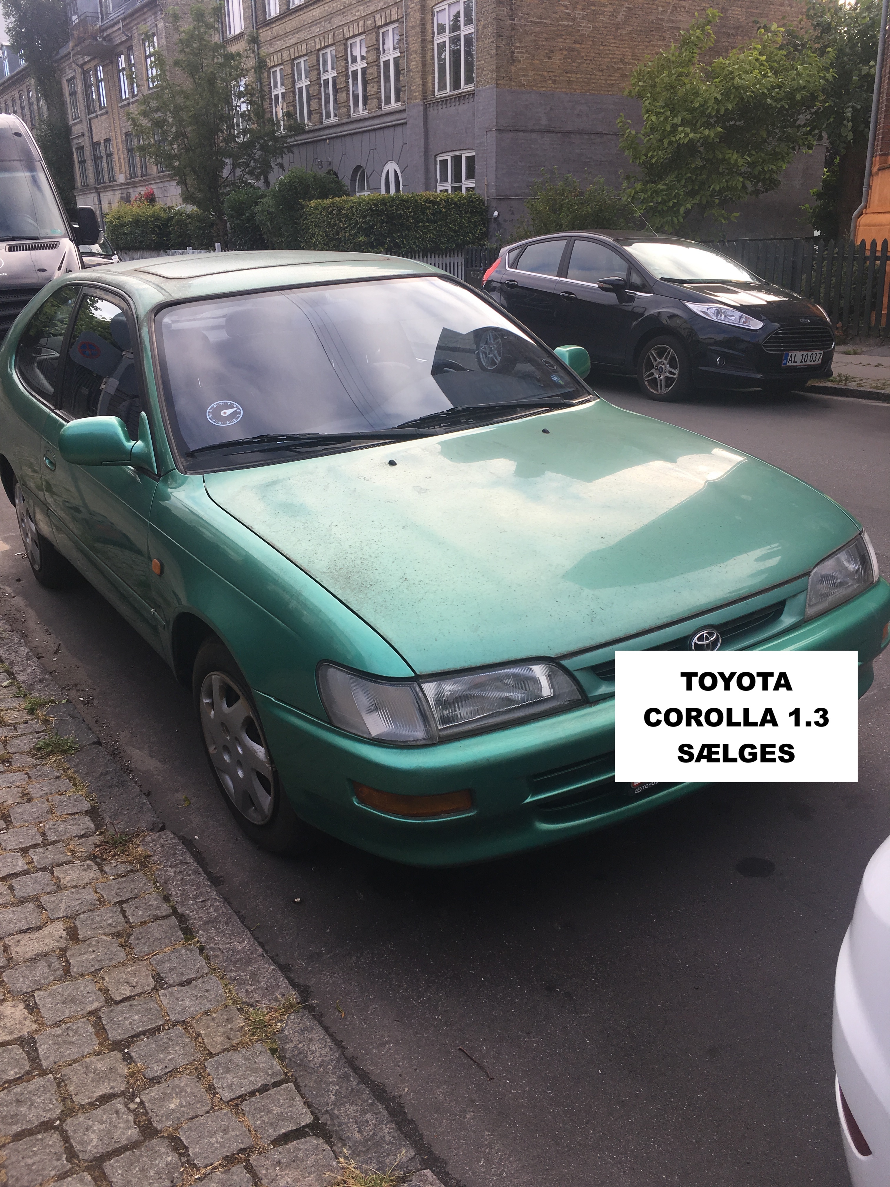 Grøn Toyota Corolla fra 1997