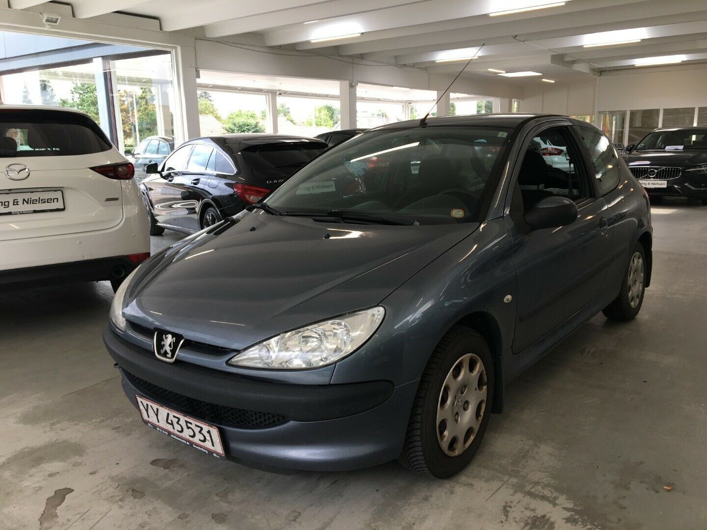 Grå Peugeot 206 fra 2007