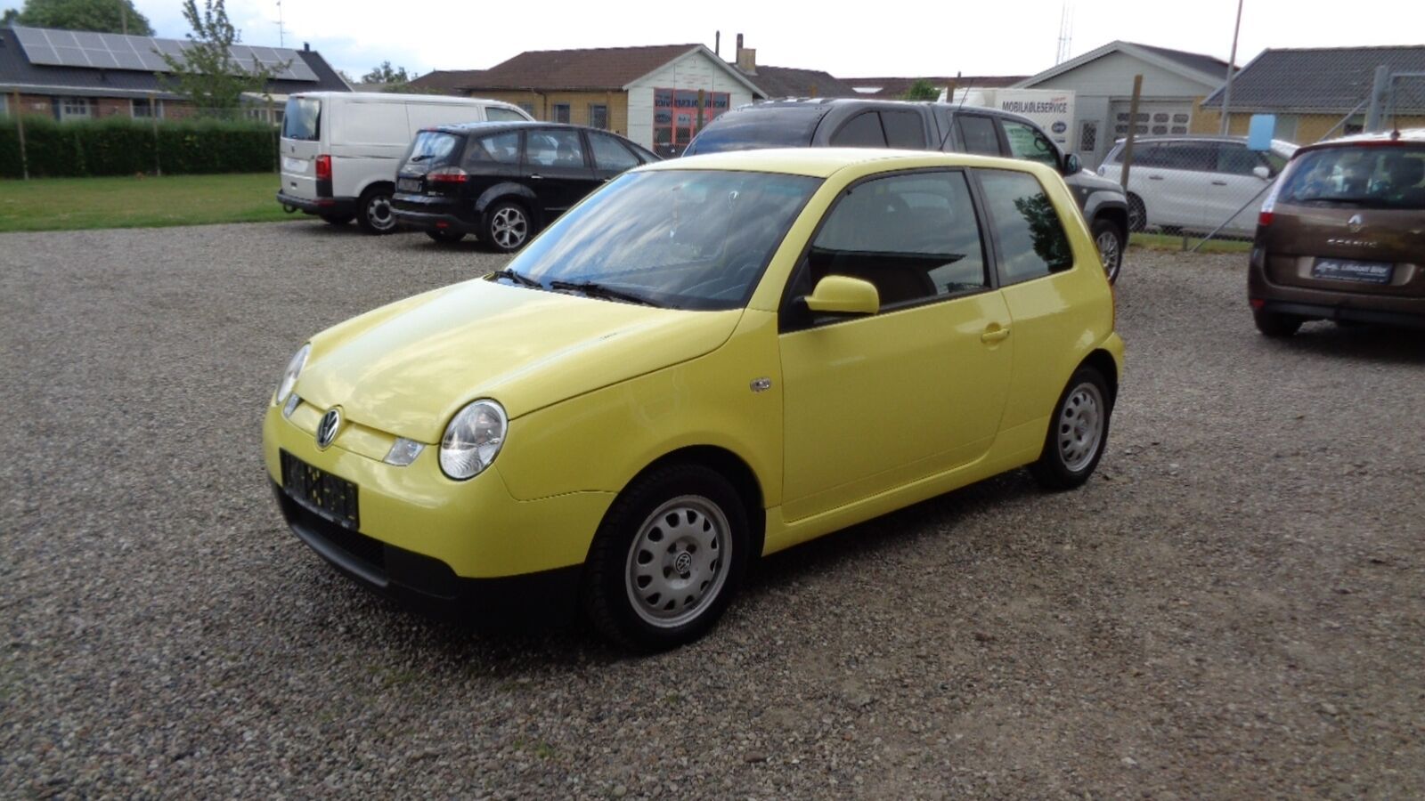 Gul VW Lupo fra 2004