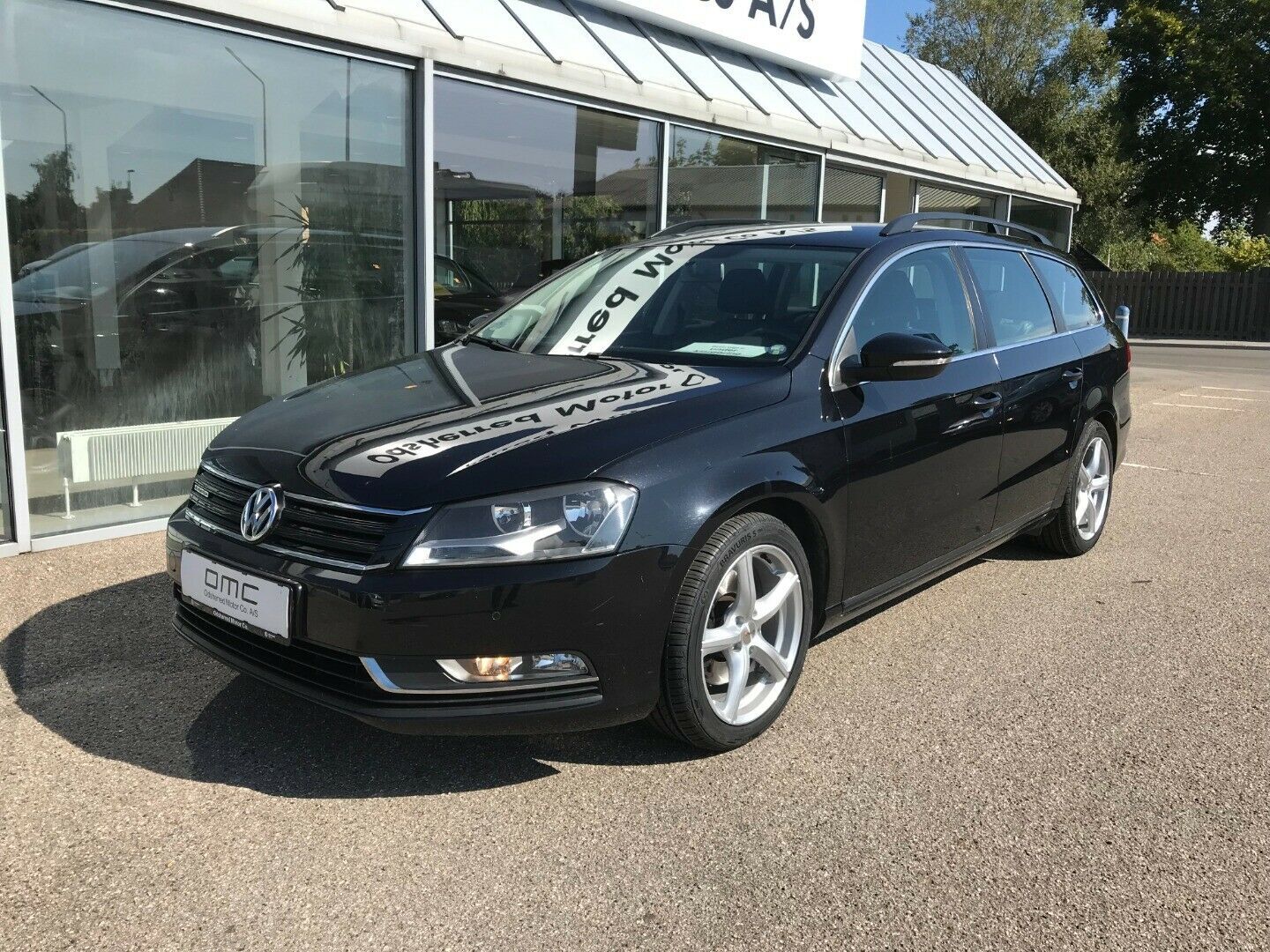 Grå VW Passat fra 2014