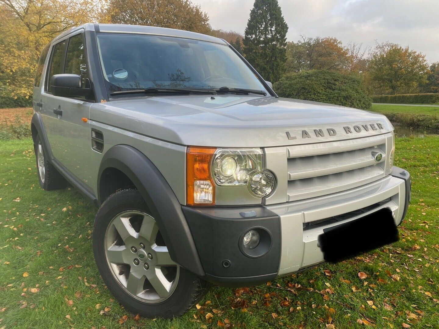 Gul Land Rover Discovery 3 fra 2006