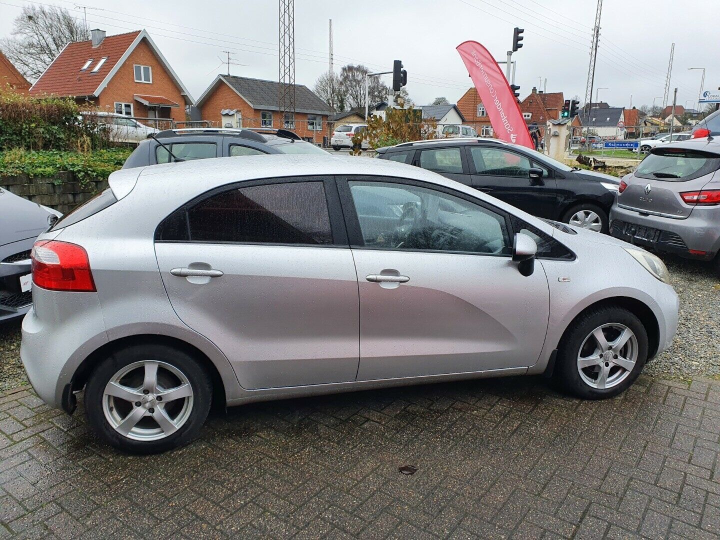 Grå Kia Rio fra 2013