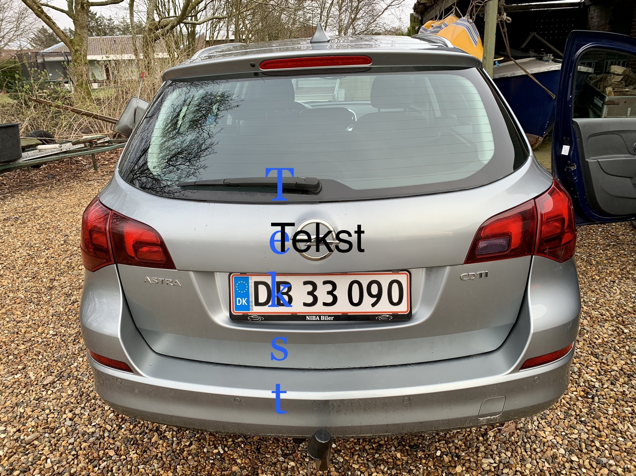 Sølv Opel Astra fra 2012