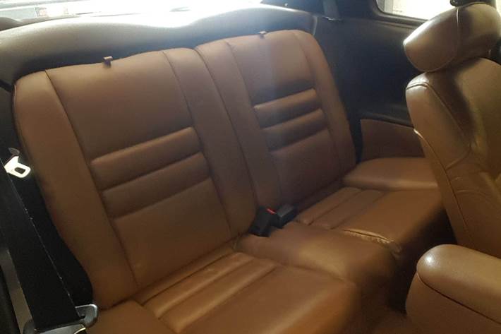 Grøn Ford Mustang fra 1995