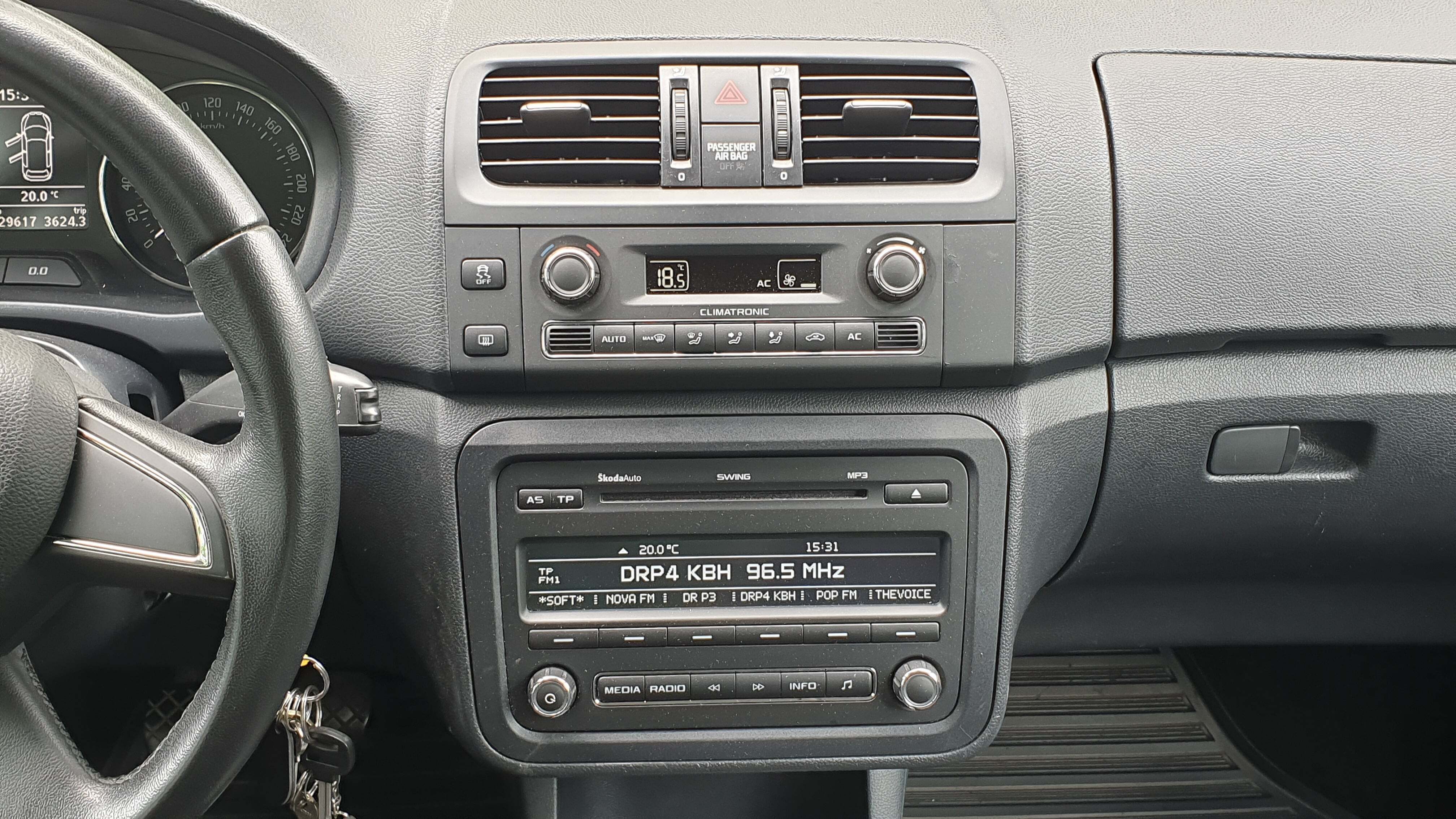 Grå Skoda Fabia fra 2013