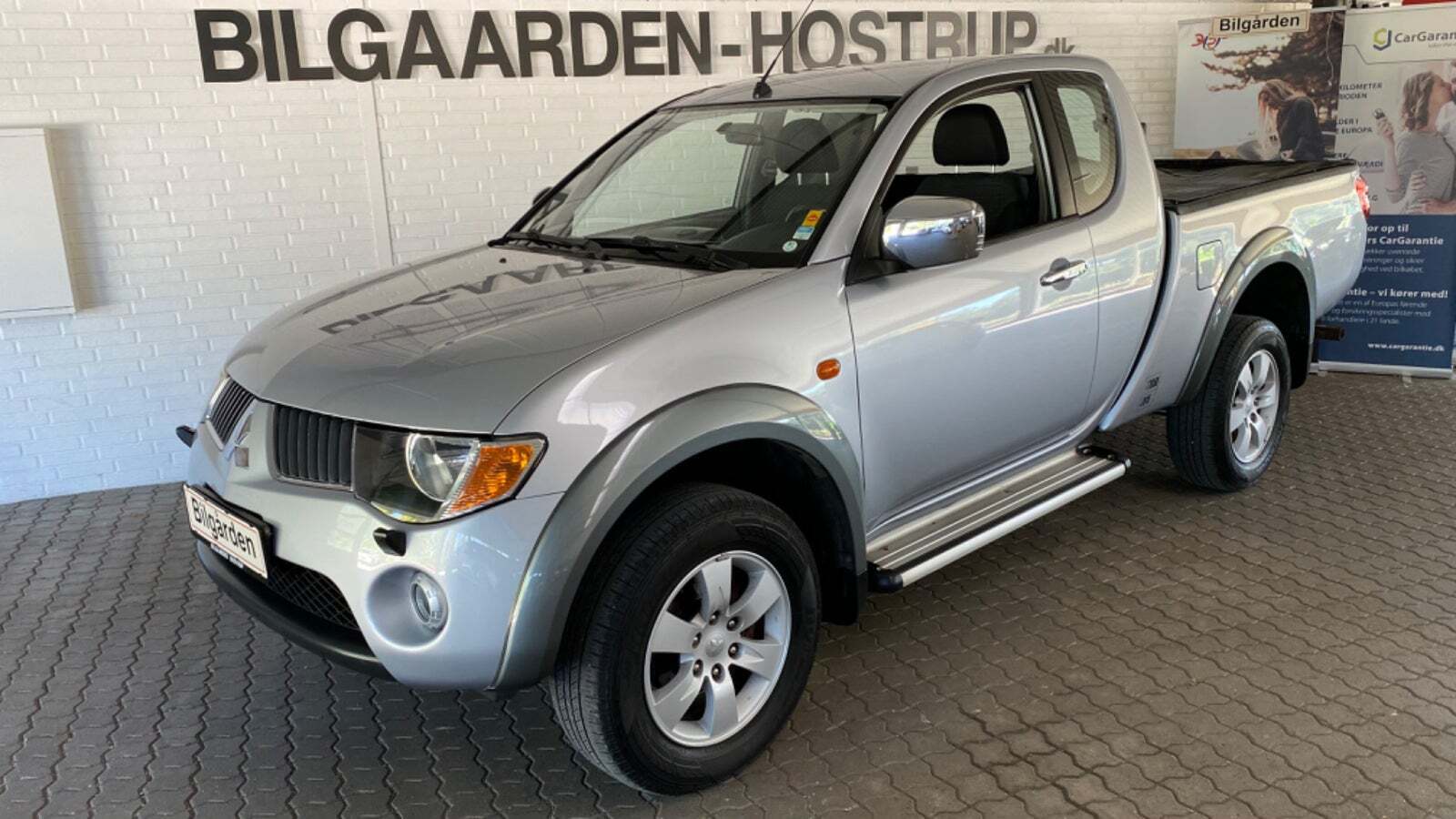 Grå Mitsubishi L200 fra 2009